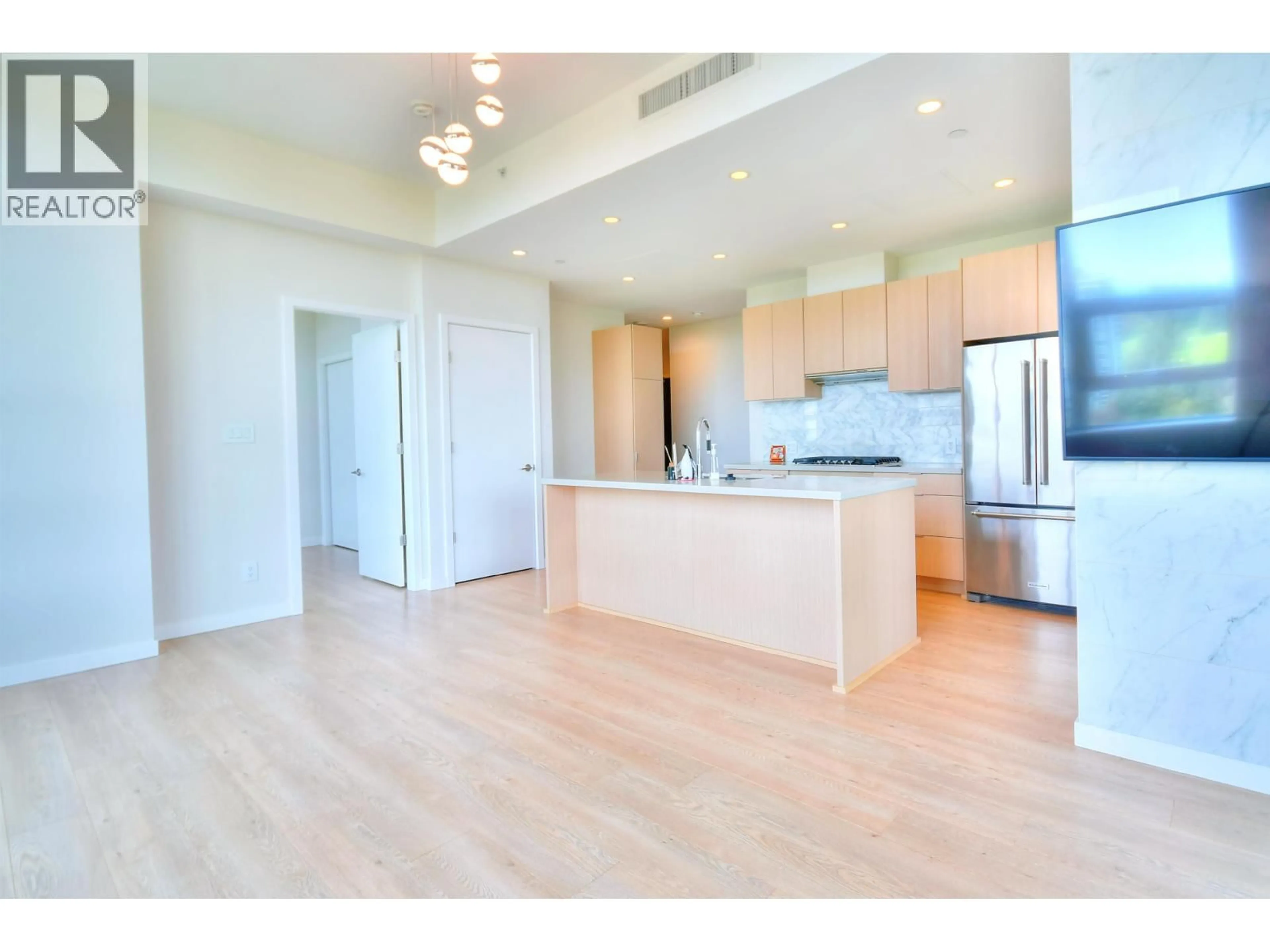 Open concept kitchen, wood/laminate floor for 2802 - 530 WHITING WAY, Coquitlam British Columbia V3J0J4