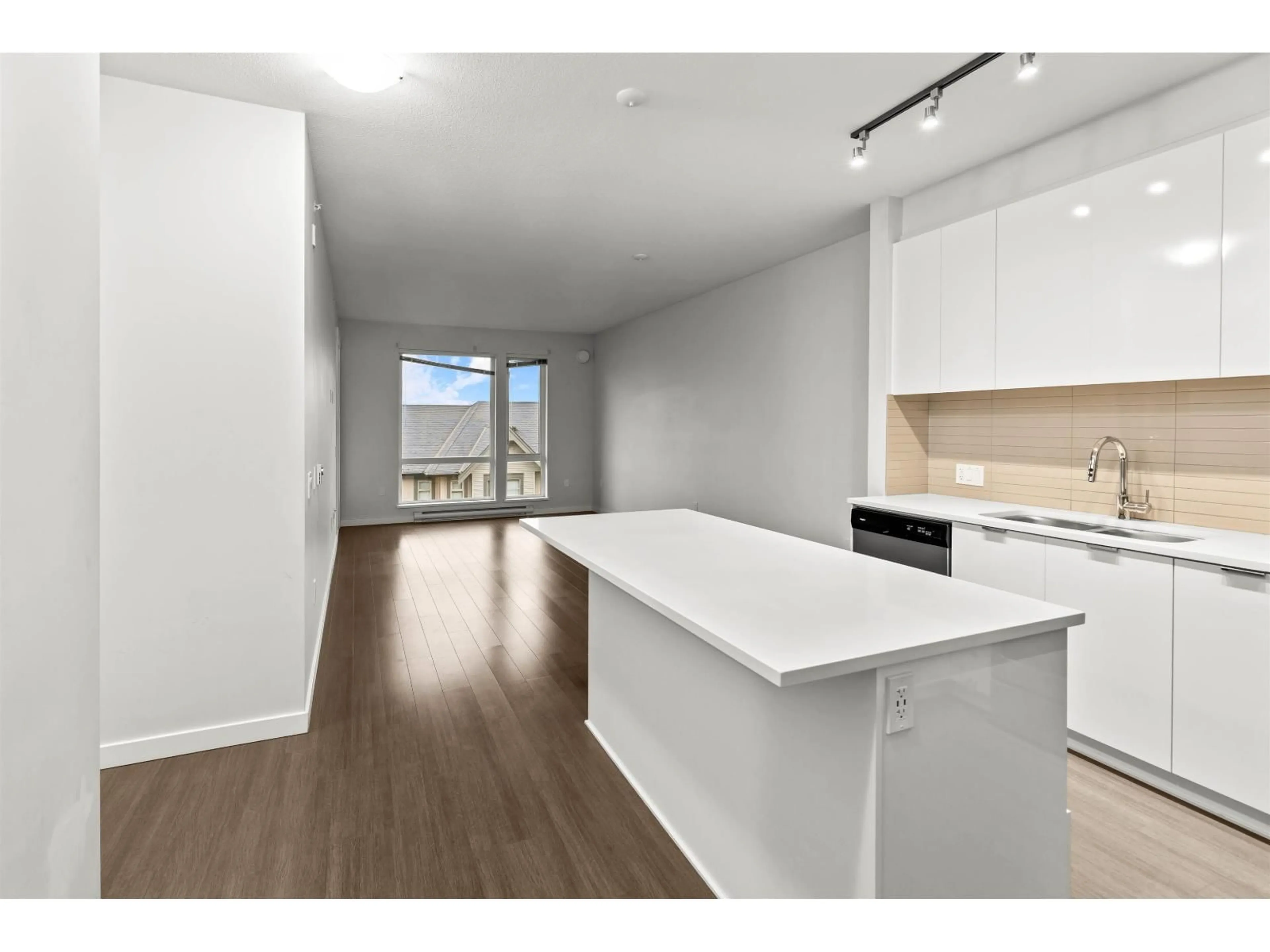 Open concept kitchen, wood/laminate floor for 410 - 31158 WESTRIDGE PLACE, Abbotsford British Columbia V2T0K5