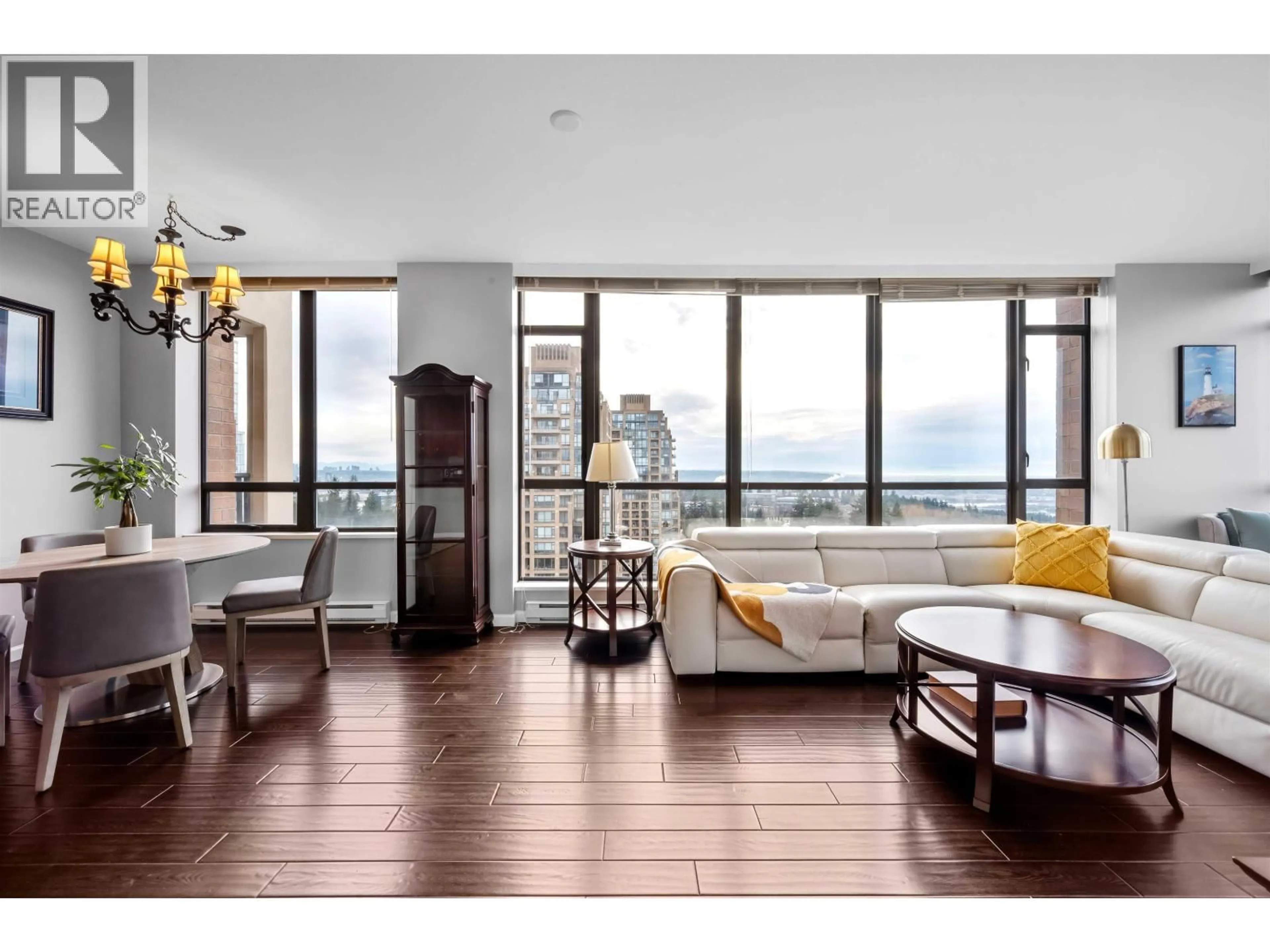 Living room with furniture, wood/laminate floor for 1701 - 6823 STATION HILL DRIVE, Burnaby British Columbia V3N0A9