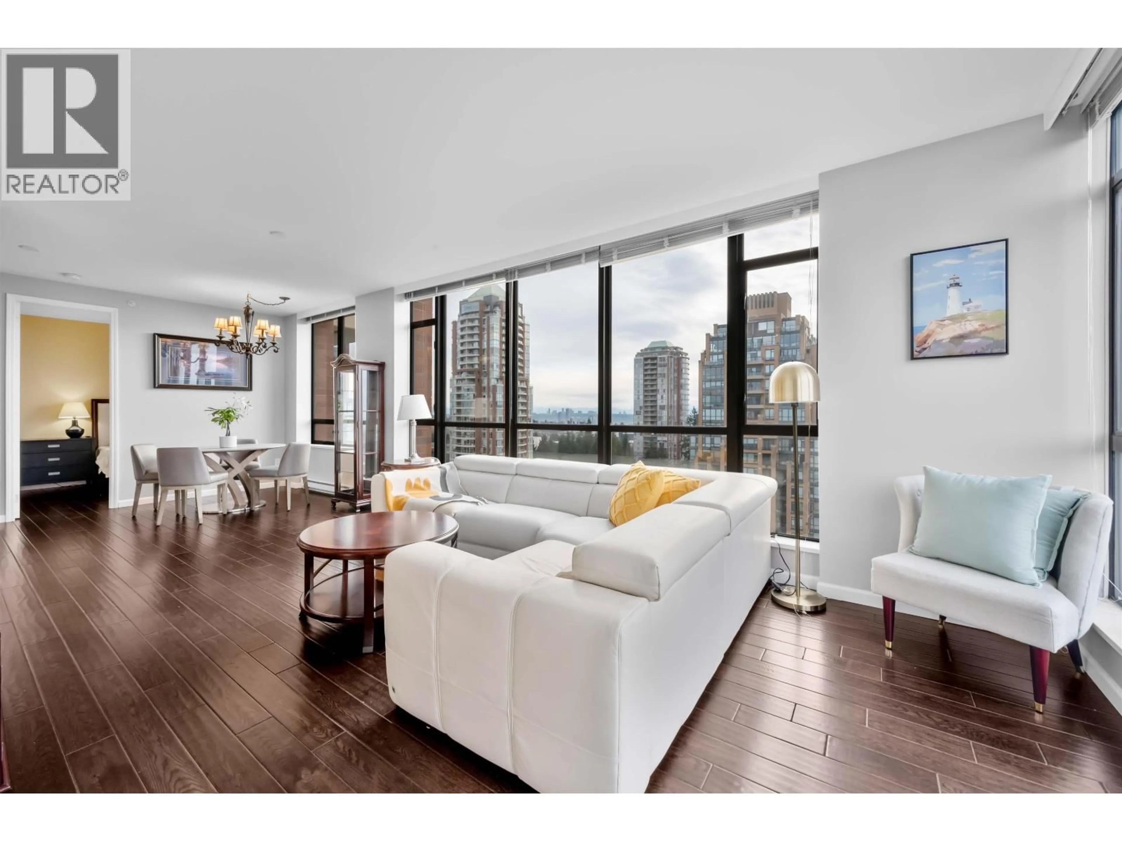 Living room with furniture, wood/laminate floor for 1701 - 6823 STATION HILL DRIVE, Burnaby British Columbia V3N0A9