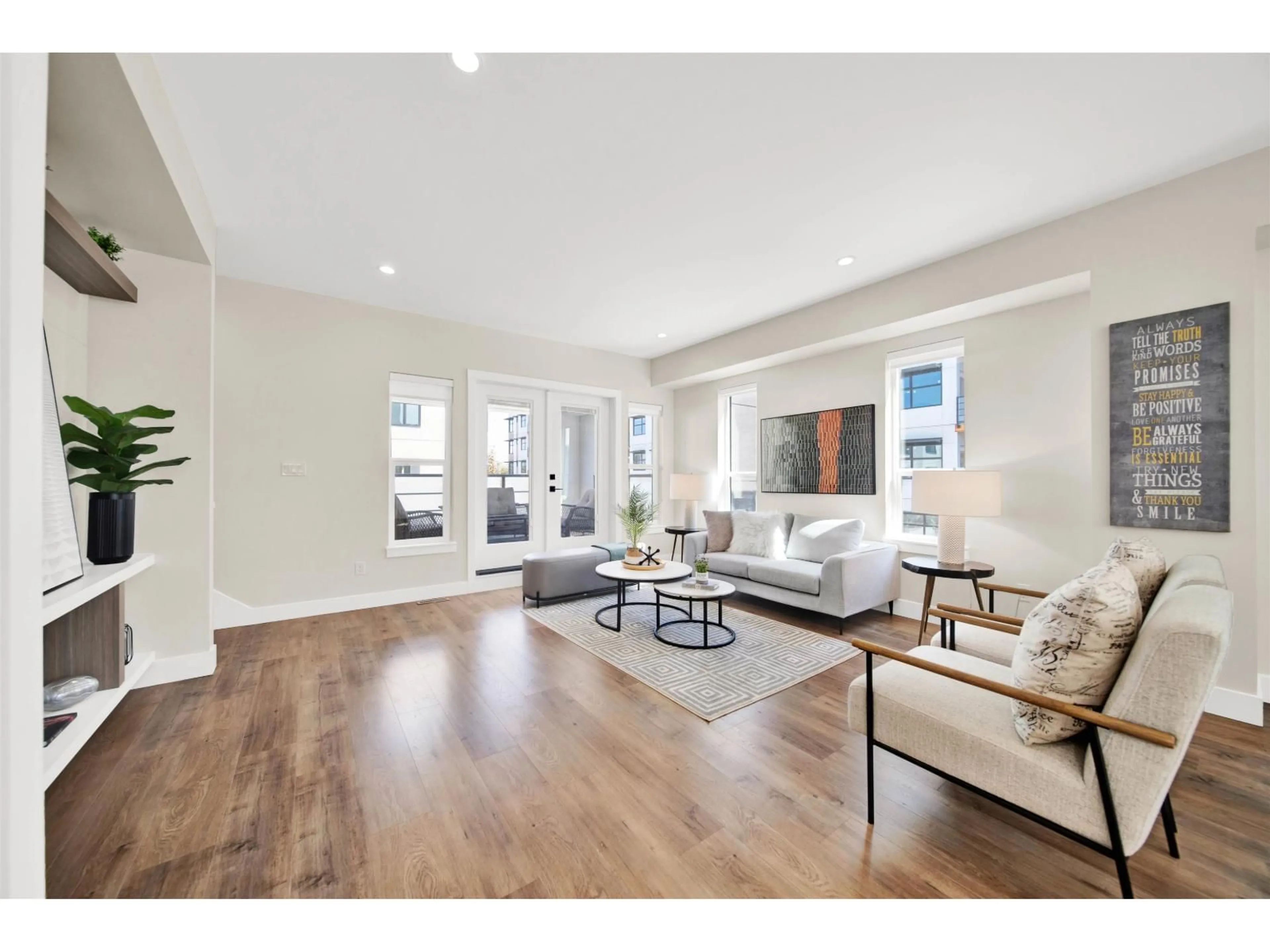 Living room with furniture, wood/laminate floor for 27 - 177 175A STREET, Surrey British Columbia V3Z1L1