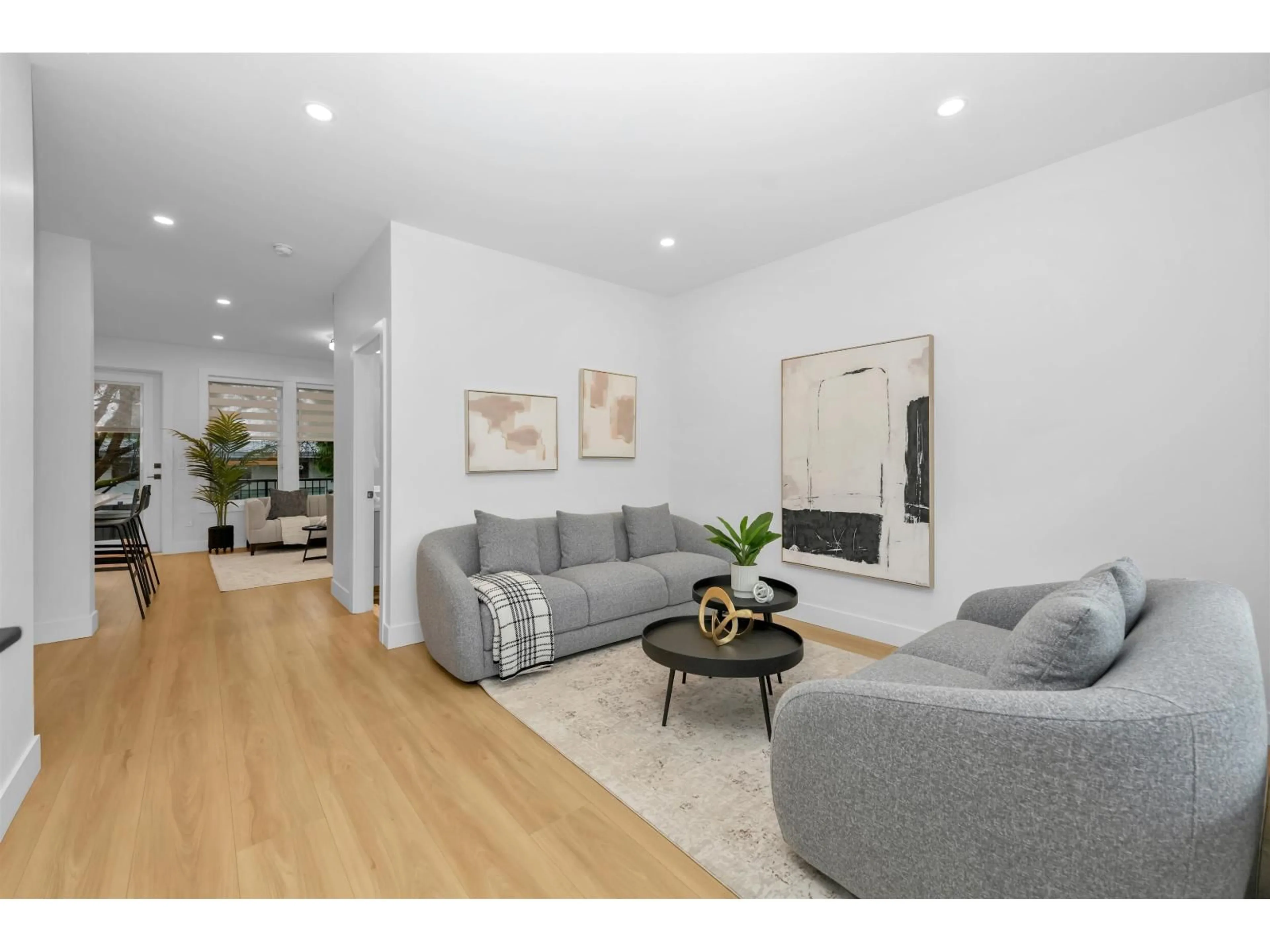 Living room with furniture, wood/laminate floor for 7 - 2168 VINEWOOD ST STREET, Abbotsford British Columbia V2S3S4