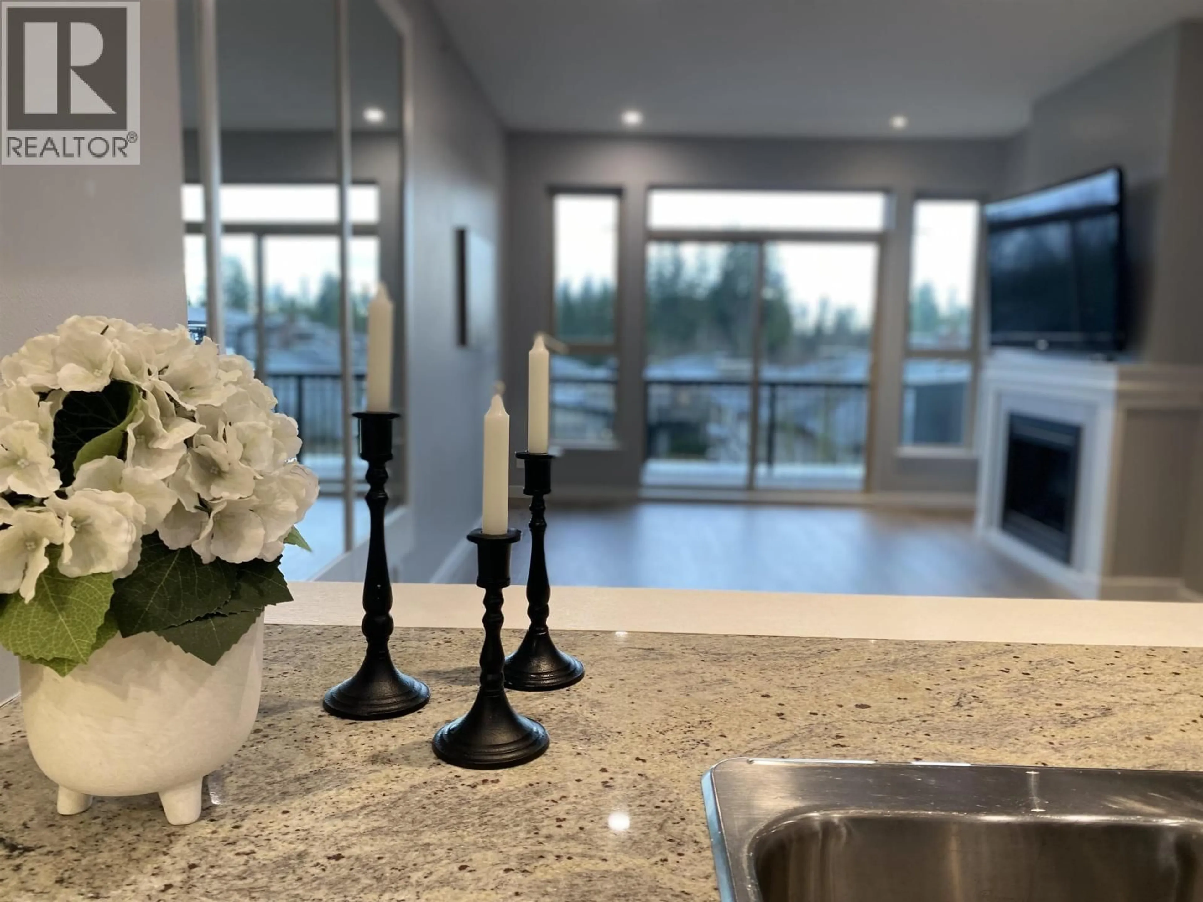 Open concept kitchen, ceramic/tile floor for 409 - 1153 KENSAL PLACE, Coquitlam British Columbia V3B0G8