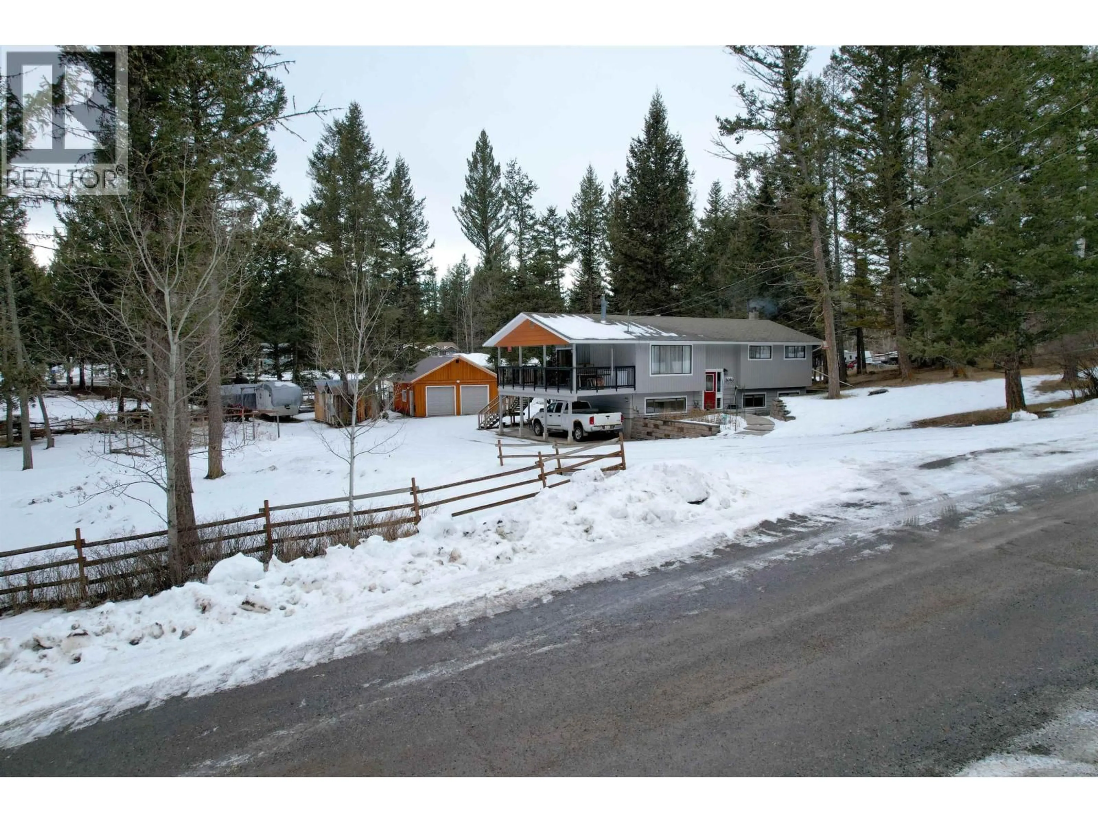 A pic from outside/outdoor area/front of a property/back of a property/a pic from drone, mountain view for 5040 HANSEN COURT, 108 Mile Ranch British Columbia V0K2Z0