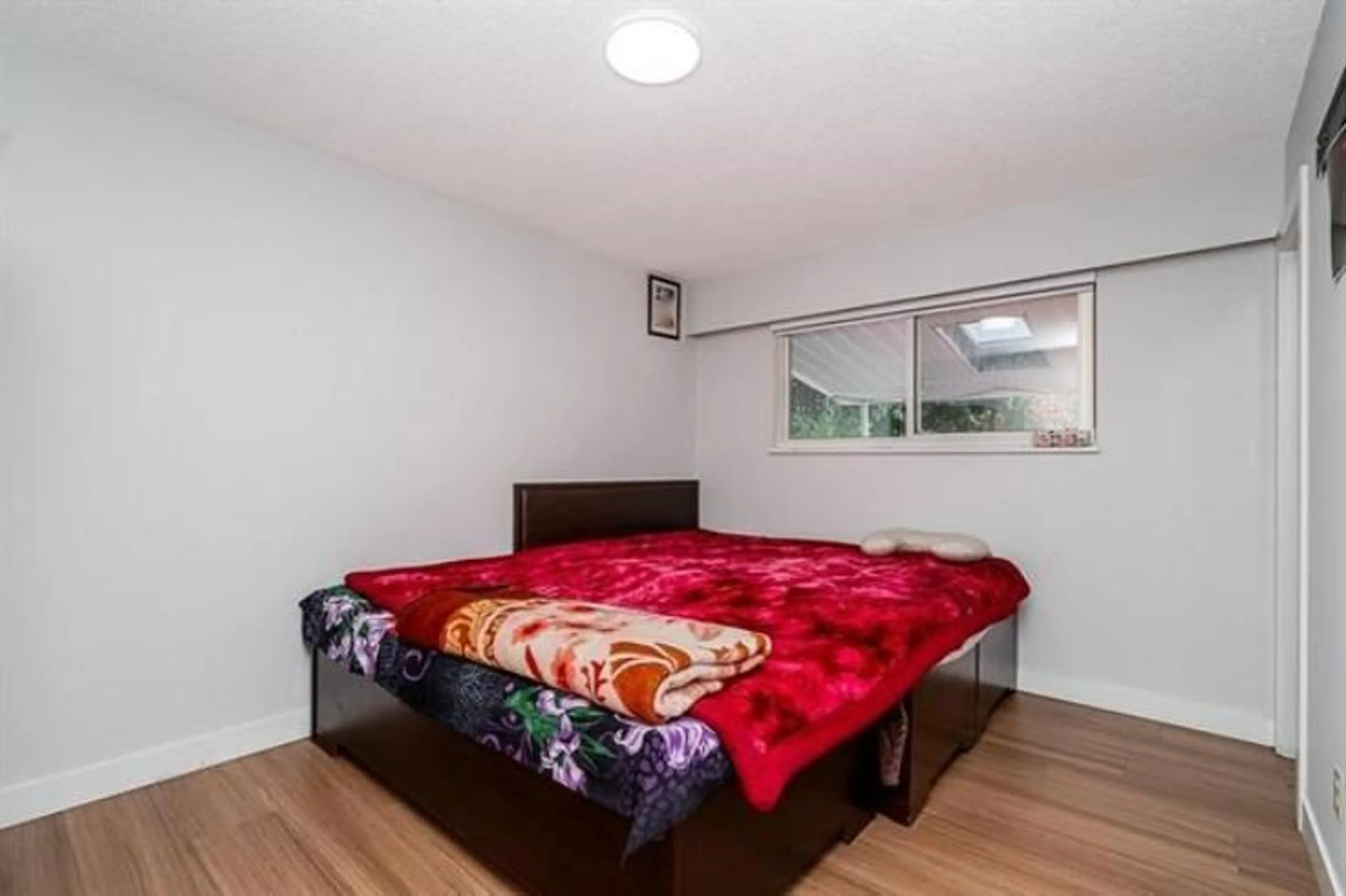 Bedroom with bed, unknown for 4660 202 STREET, Langley British Columbia V3A5J3