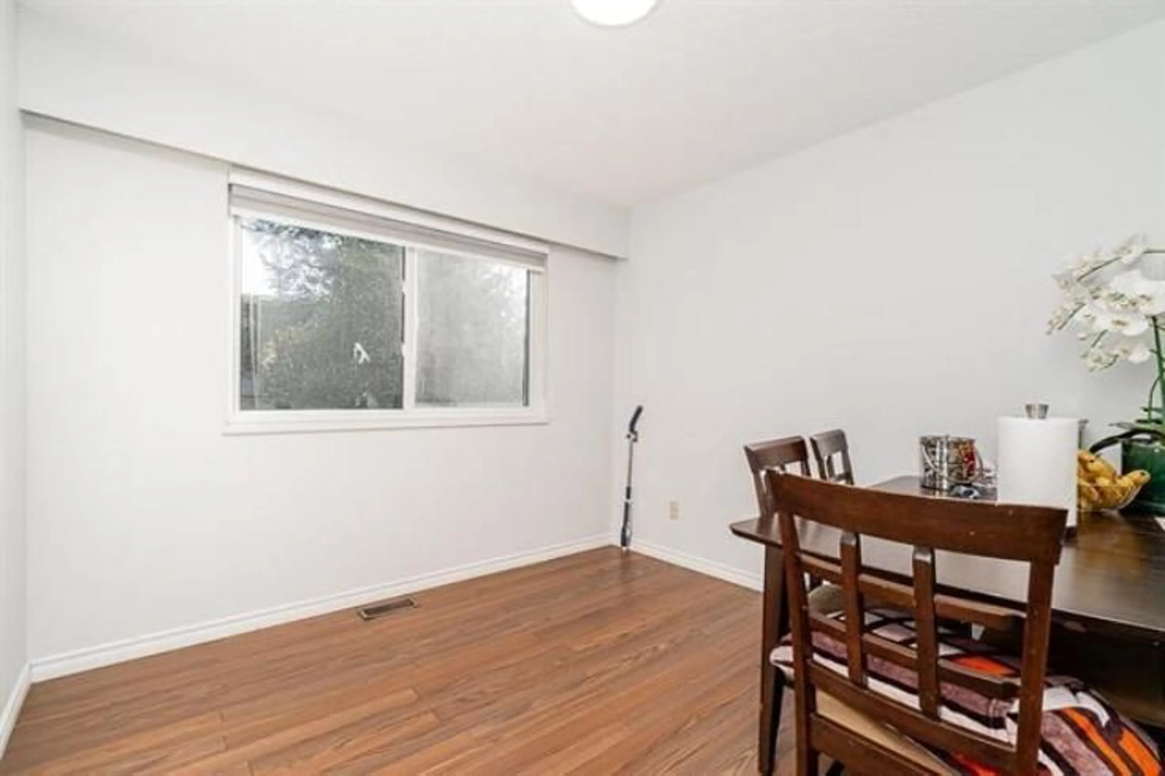Dining room, wood/laminate floor for 4660 202 STREET, Langley British Columbia V3A5J3