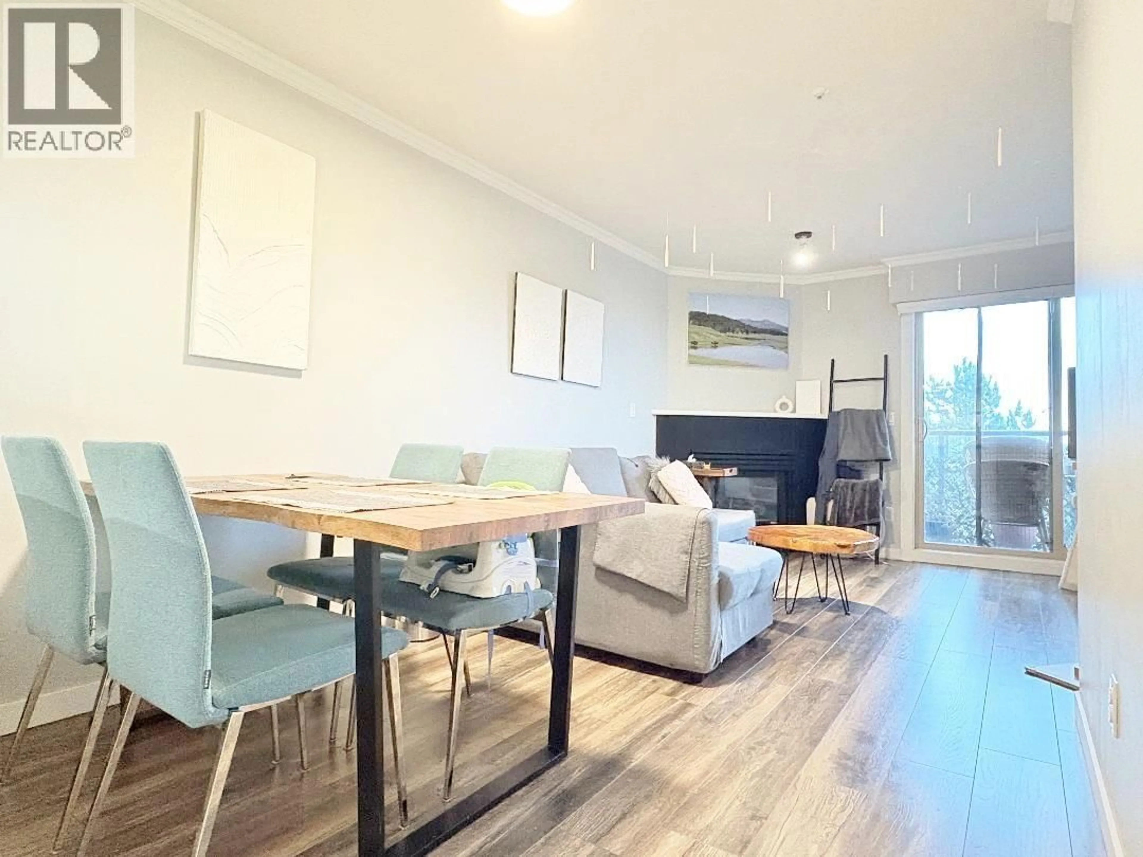 Living room with furniture, wood/laminate floor for 307 - 210 CARNARVON STREET, New Westminster British Columbia V3L1B8