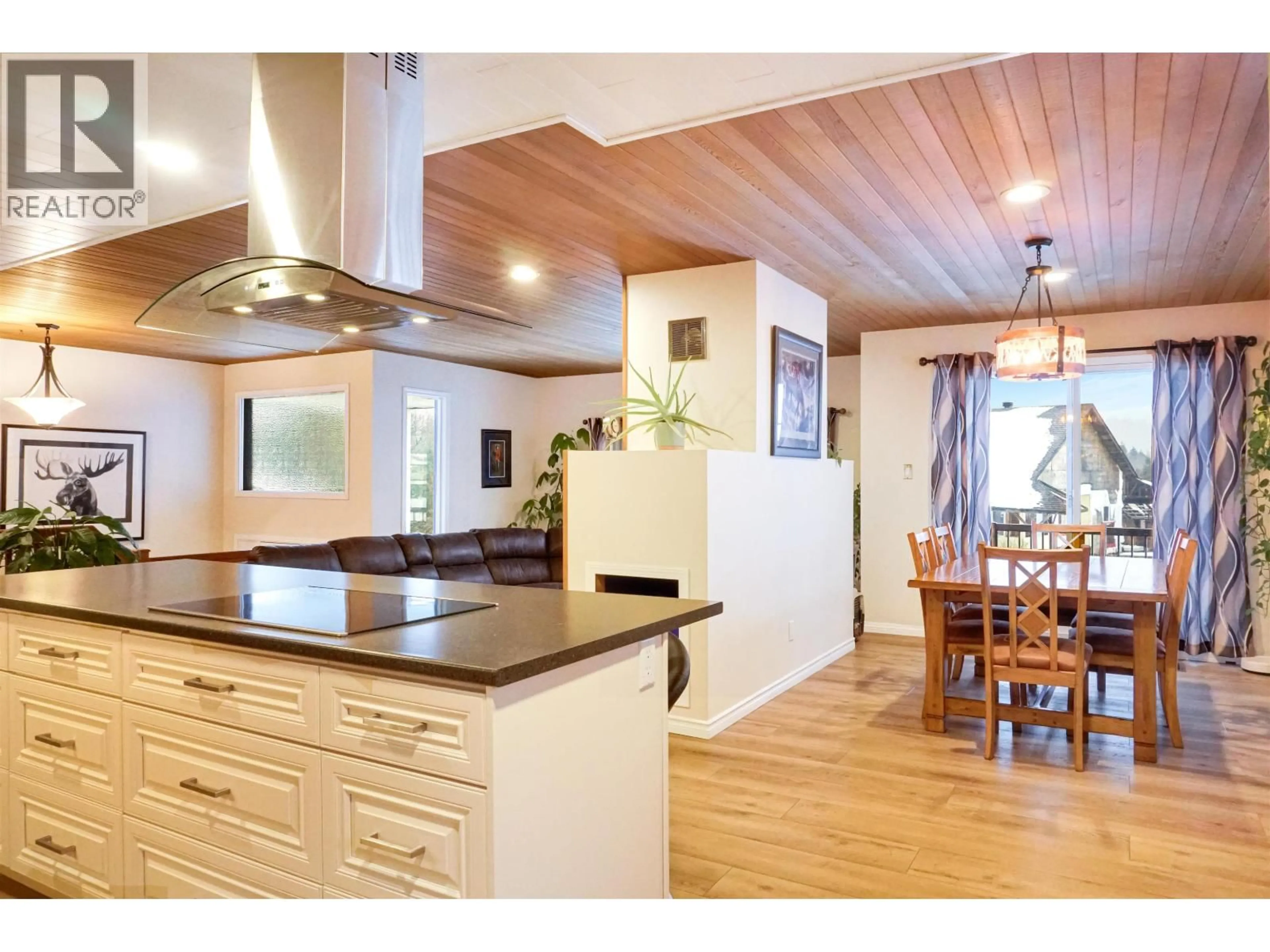 Open concept kitchen, wood/laminate floor for 54 SMITH STREET, Kitimat British Columbia V8C2R5