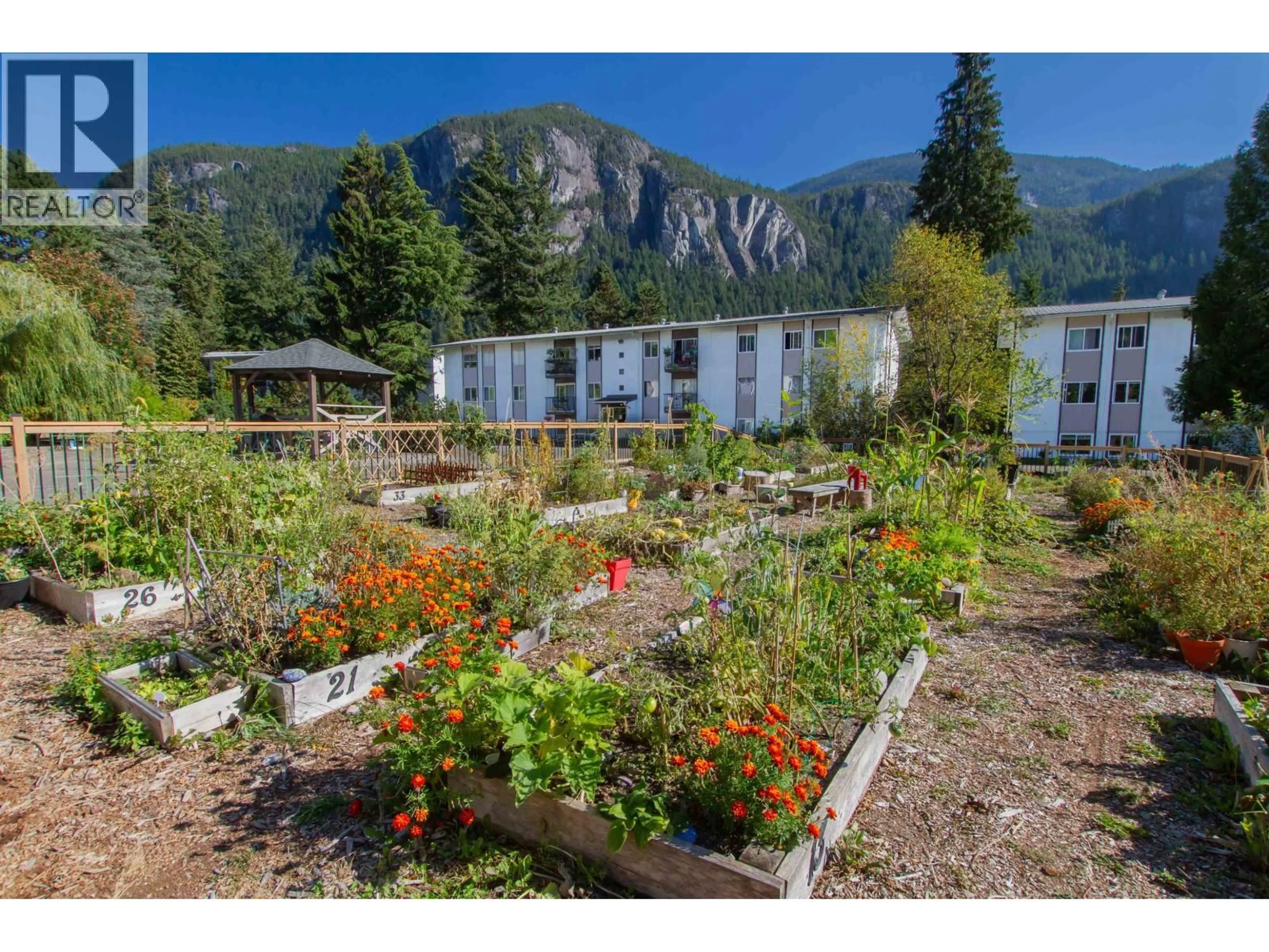 A pic from outside/outdoor area/front of a property/back of a property/a pic from drone, mountain view for 49 - 38185 WESTWAY AVENUE, Squamish British Columbia V8B0L6