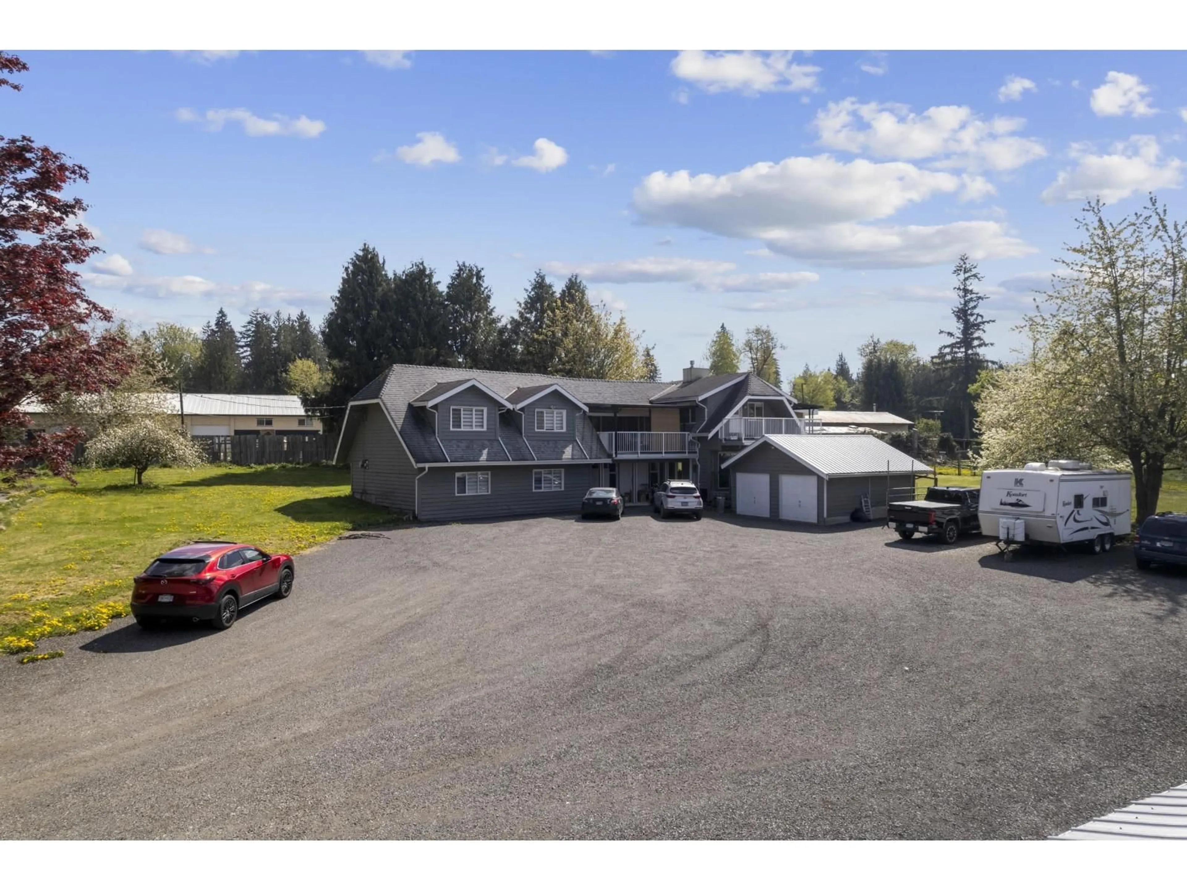 A pic from outside/outdoor area/front of a property/back of a property/a pic from drone, mountain view for 25412 58 AVENUE, Langley British Columbia V4W1G7