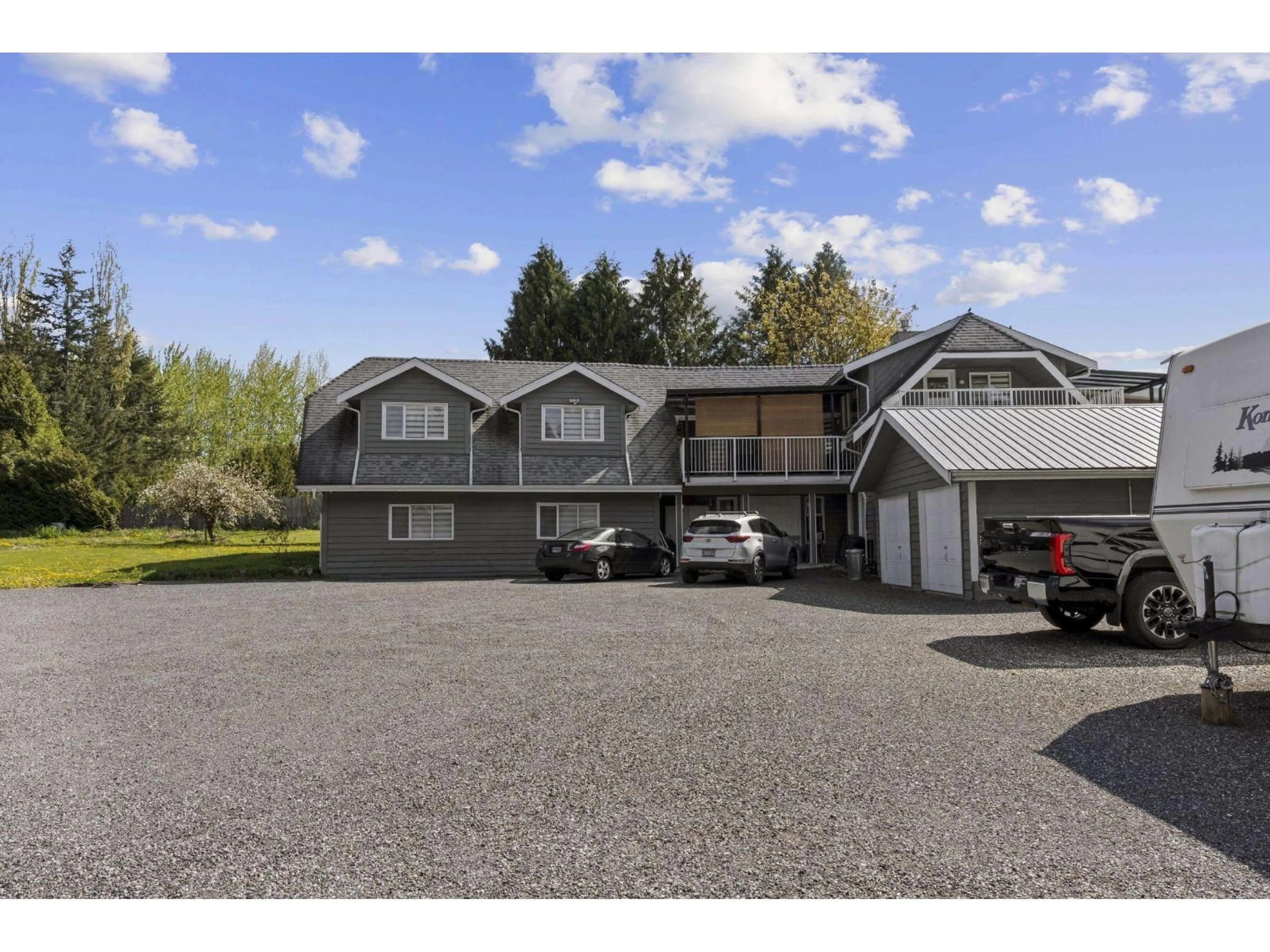 A pic from outside/outdoor area/front of a property/back of a property/a pic from drone, street for 25412 58 AVENUE, Langley British Columbia V4W1G7
