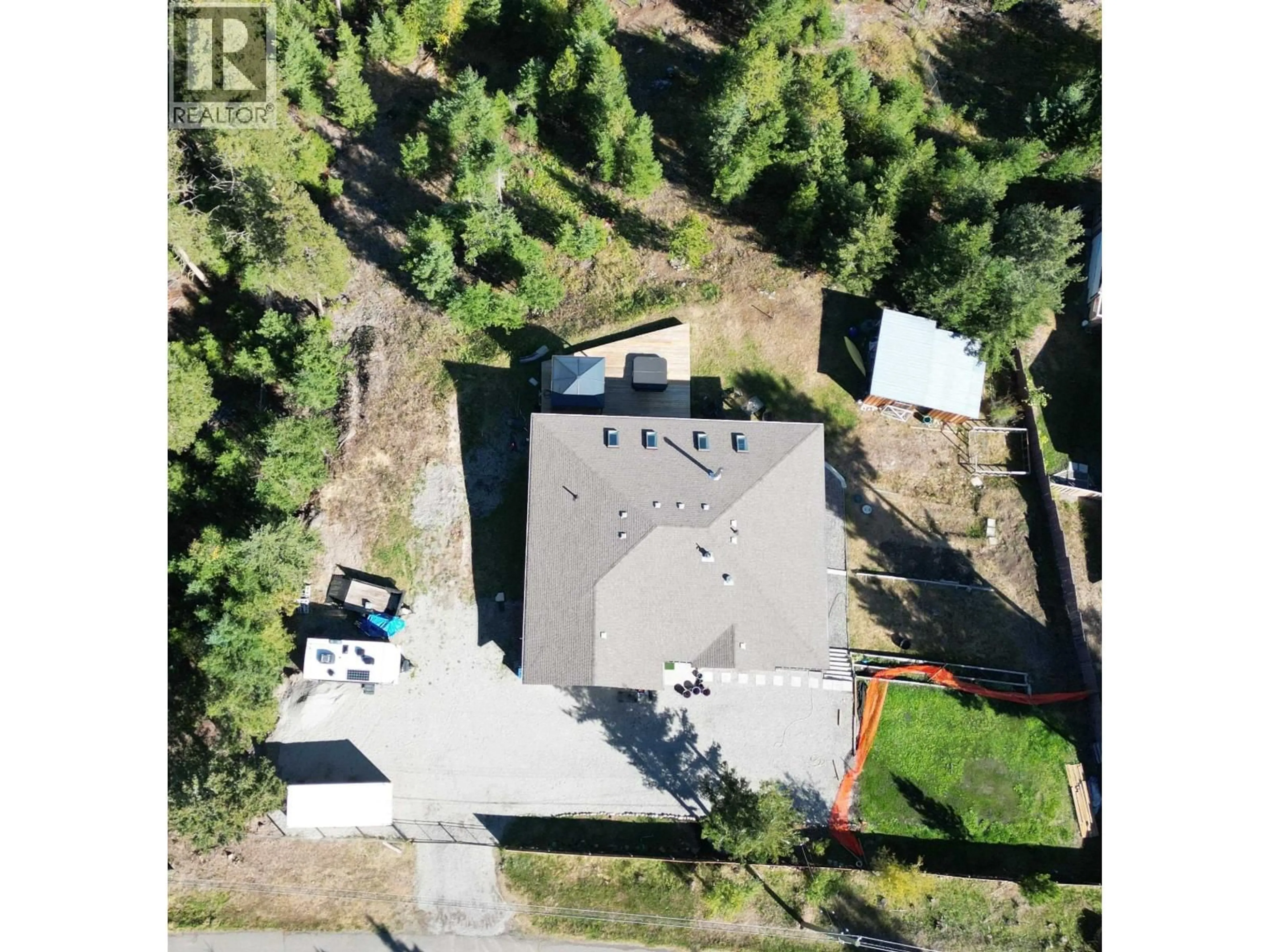 A pic from outside/outdoor area/front of a property/back of a property/a pic from drone, building for 4849 BRYAN CRESCENT, 108 Mile Ranch British Columbia V0K2Z0