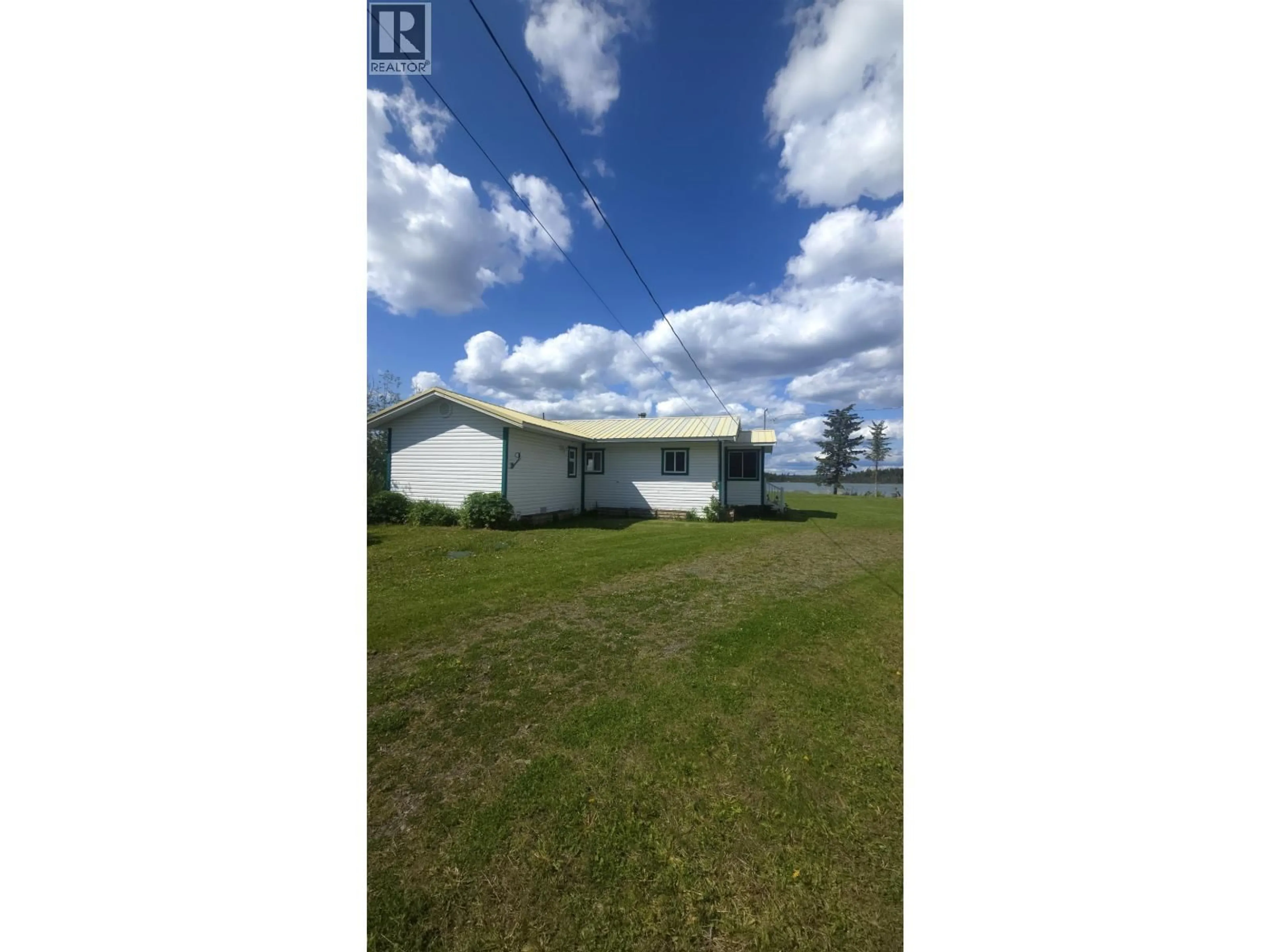 A pic from outside/outdoor area/front of a property/back of a property/a pic from drone, building for 7597 NORTH POINT ROAD, Sheridan Lake British Columbia V0K1X1