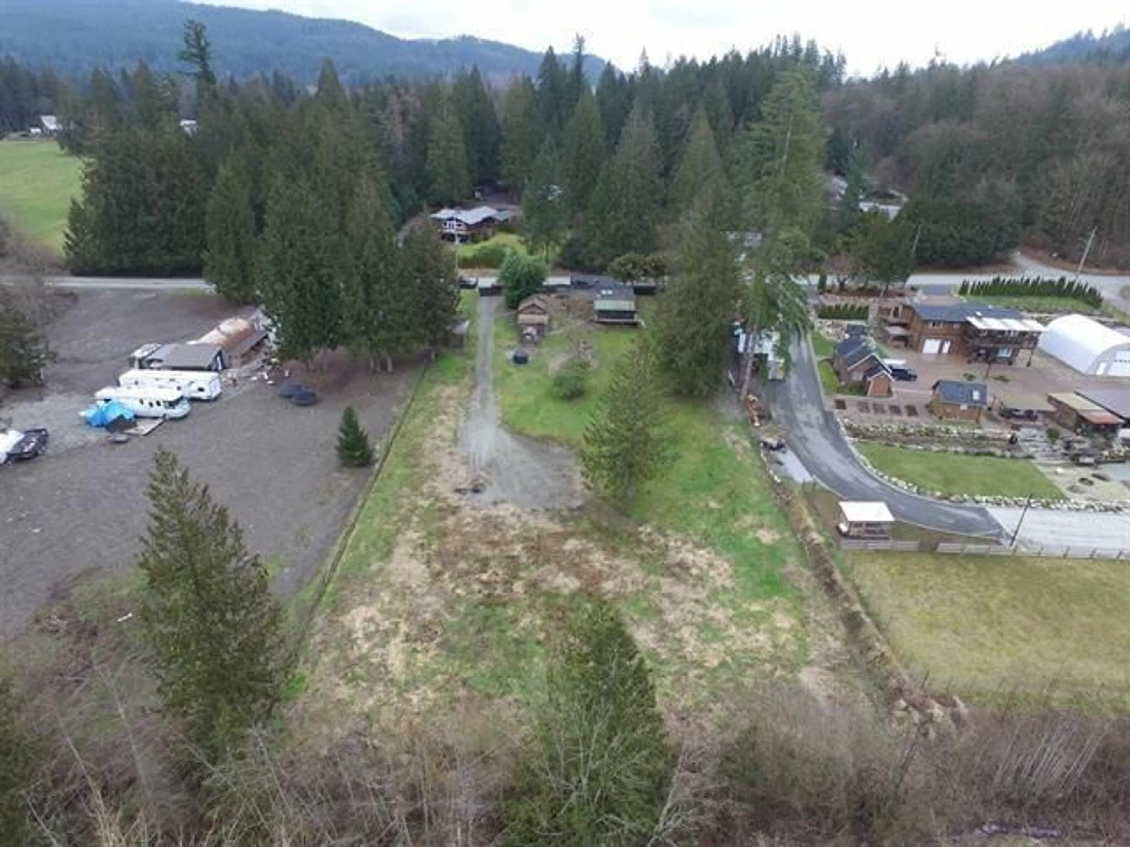 A pic from outside/outdoor area/front of a property/back of a property/a pic from drone, mountain view for 10053 WOLFE STREET, Mission British Columbia V4S1G7