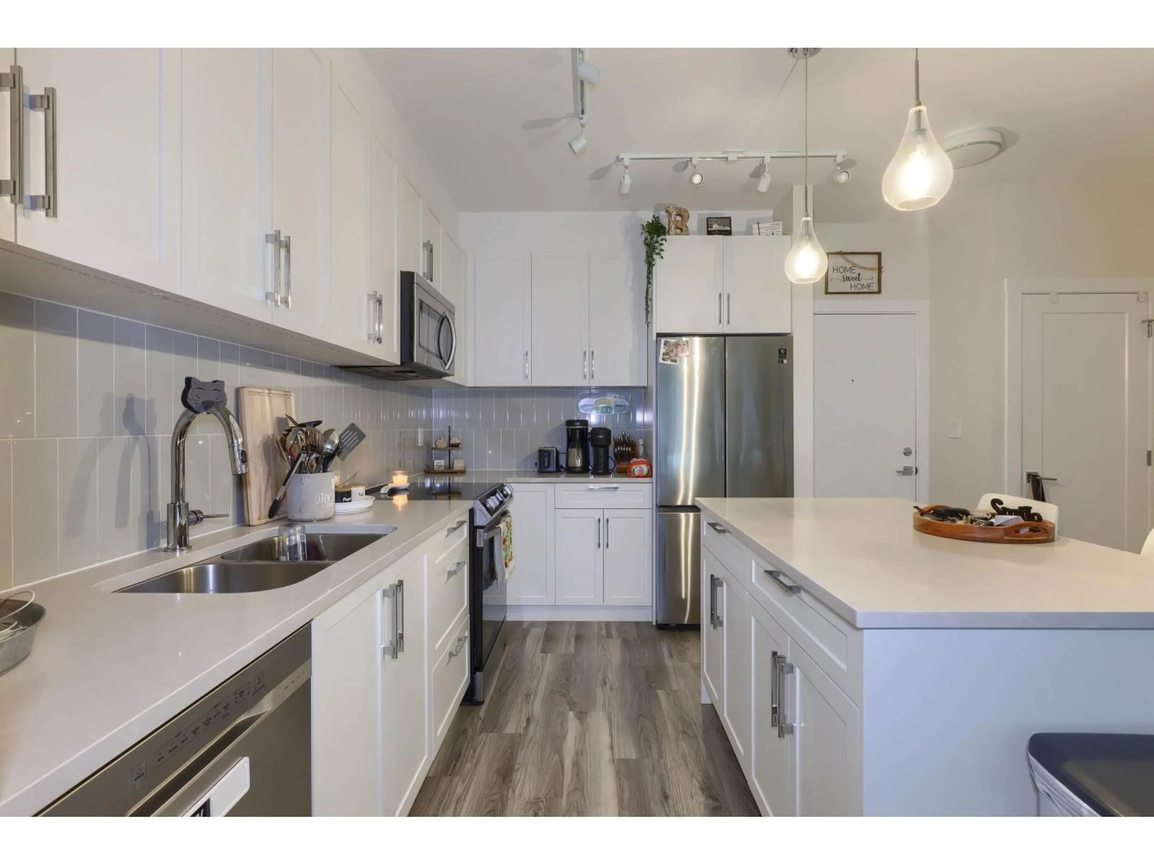 Open concept kitchen, unknown for 307 - 20356 72B AVENUE, Langley British Columbia V2Y4J9