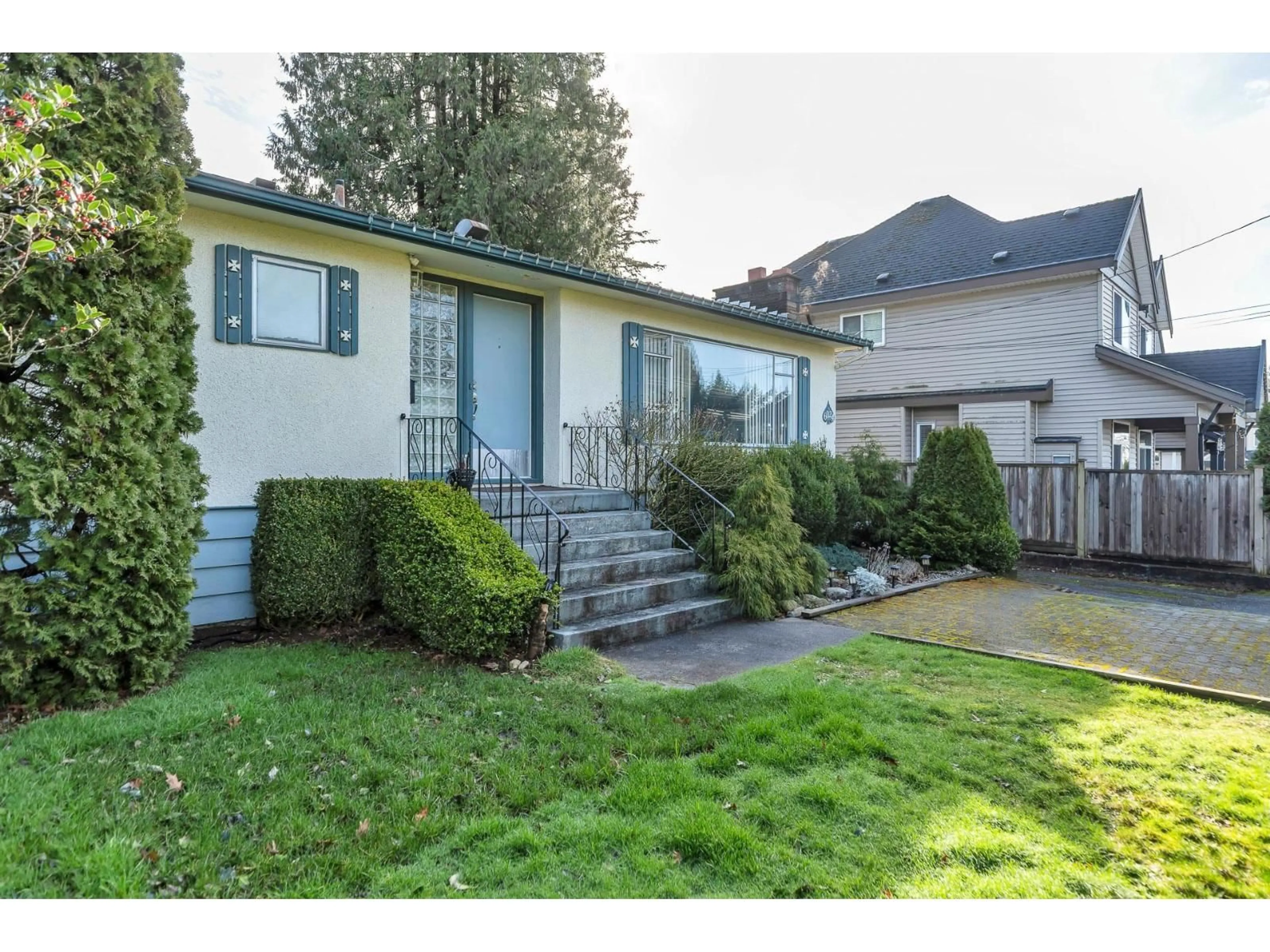 Home with vinyl exterior material, street for 6024 128 STREET, Surrey British Columbia V3X1T1