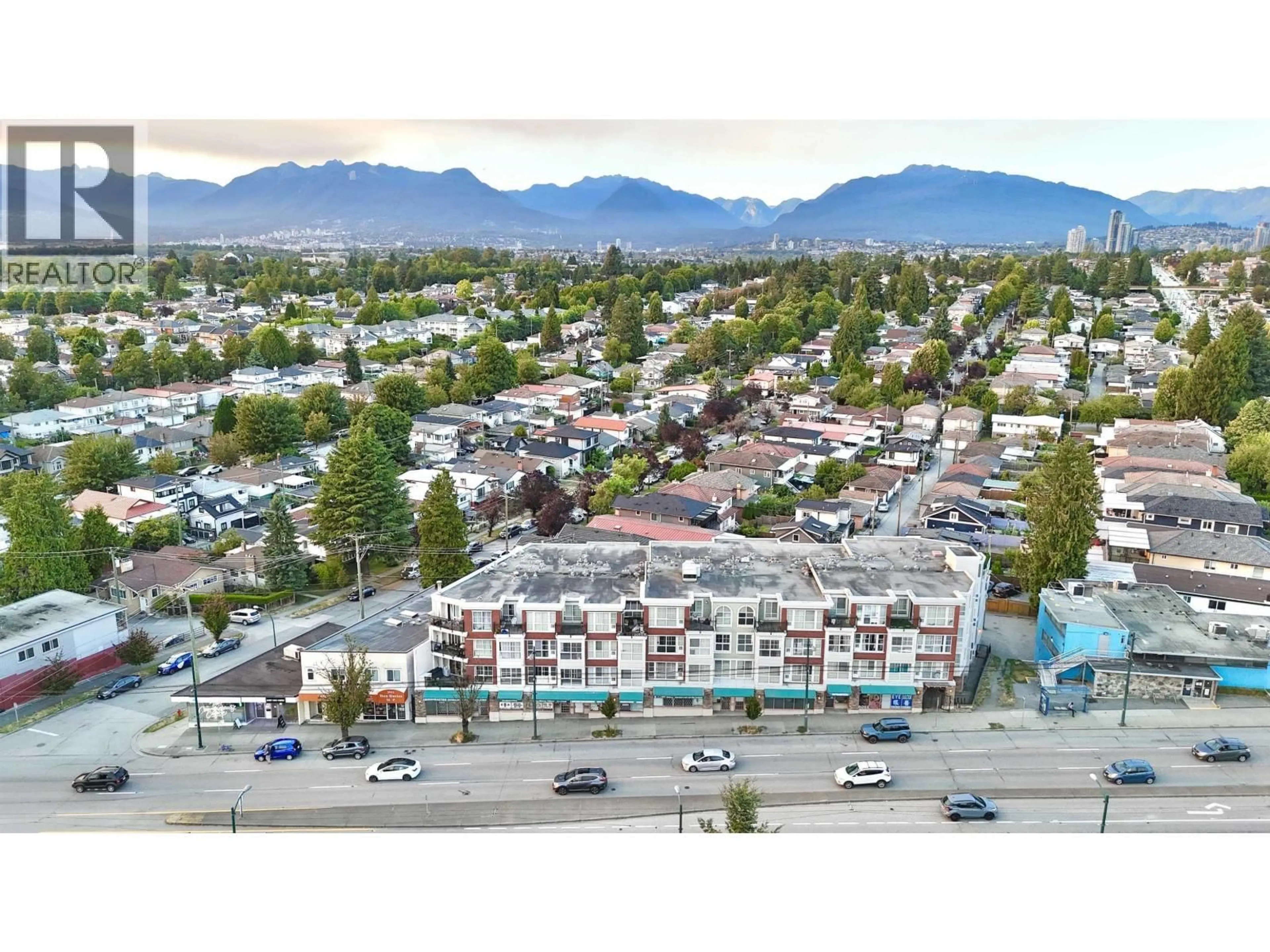 A pic from outside/outdoor area/front of a property/back of a property/a pic from drone, mountain view for 102 - 2973 KINGSWAY, Vancouver British Columbia V5R5J4