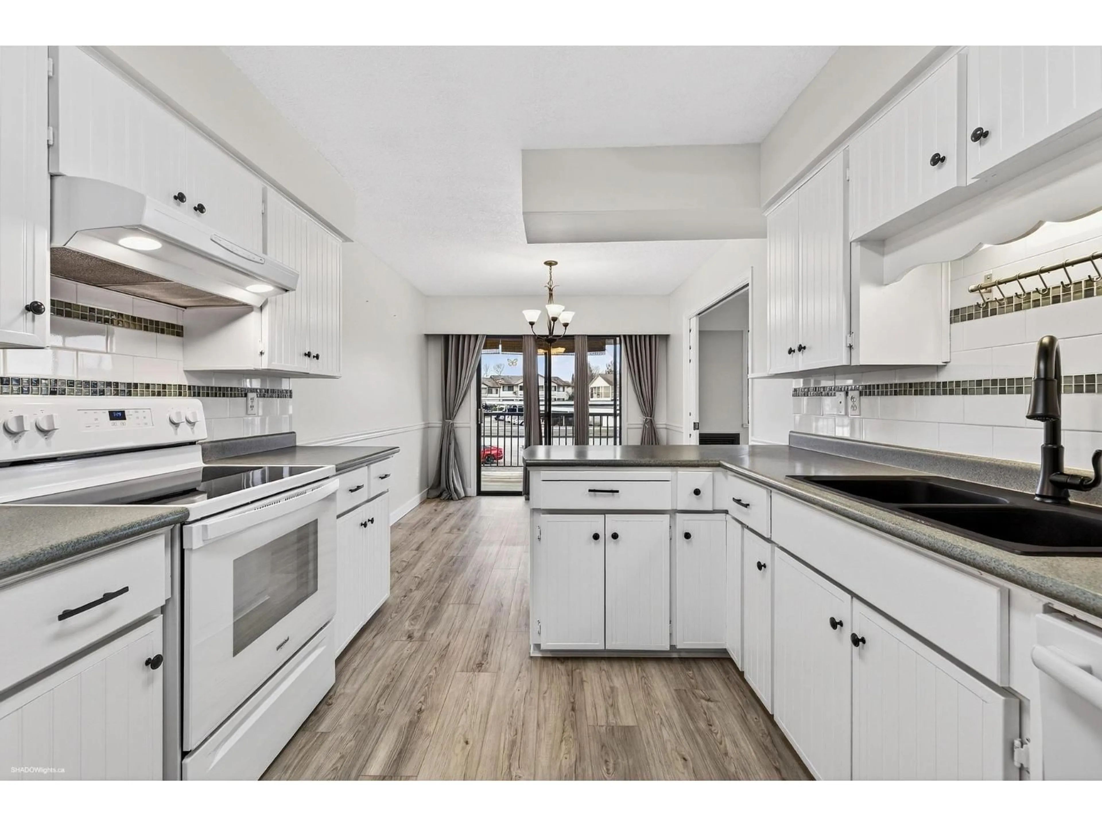 Open concept kitchen, unknown for 61 - 32959 GEORGE FERGUSON WAY, Abbotsford British Columbia V2S7W9