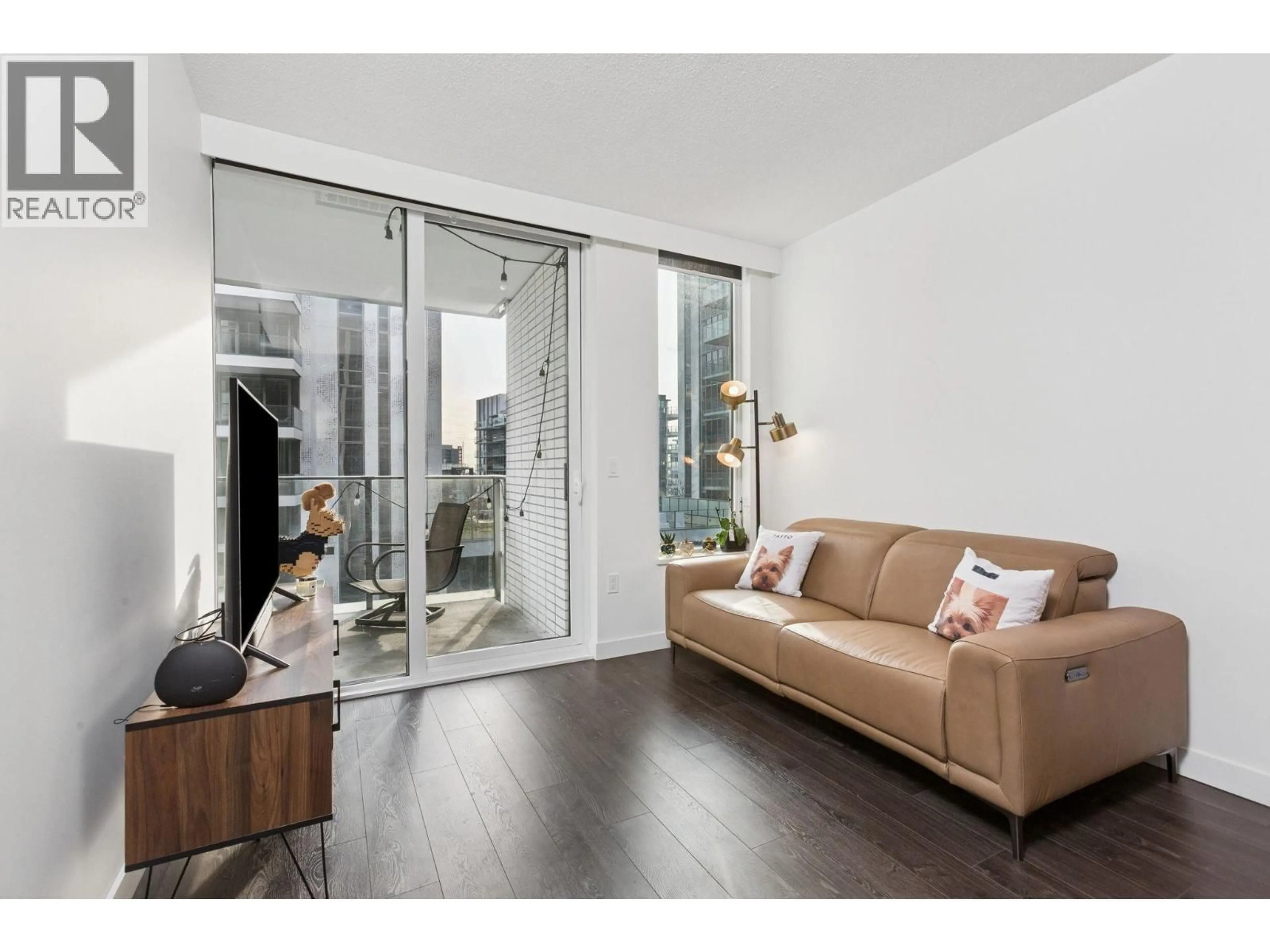 Living room with furniture, wood/laminate floor for 838 - 3328 NO. 3 ROAD, Richmond British Columbia V6X0X1