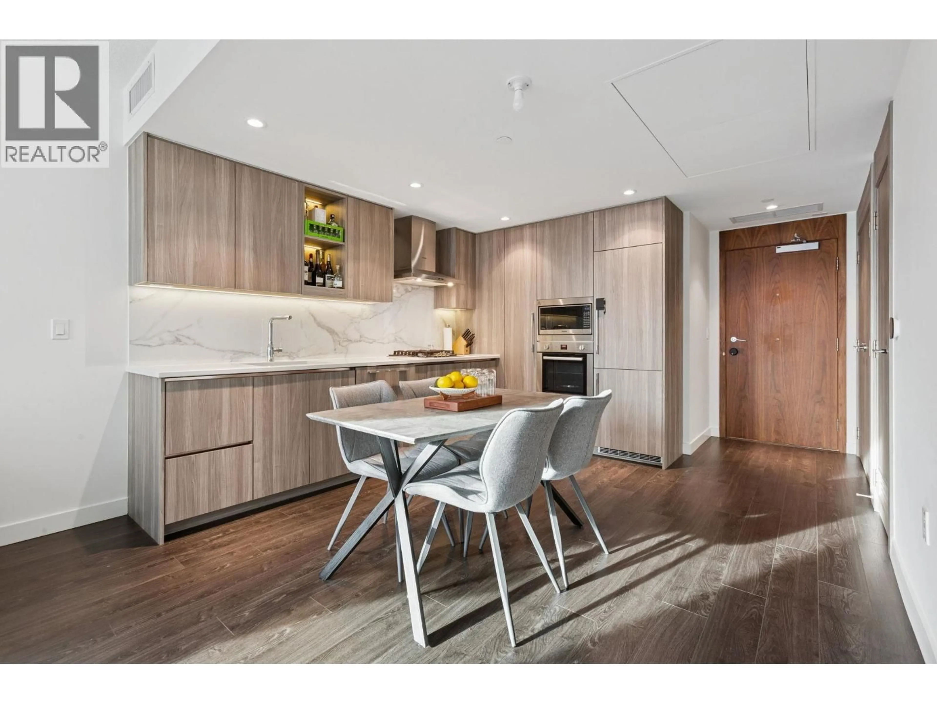 Open concept kitchen, wood/laminate floor for 838 - 3328 NO. 3 ROAD, Richmond British Columbia V6X0X1