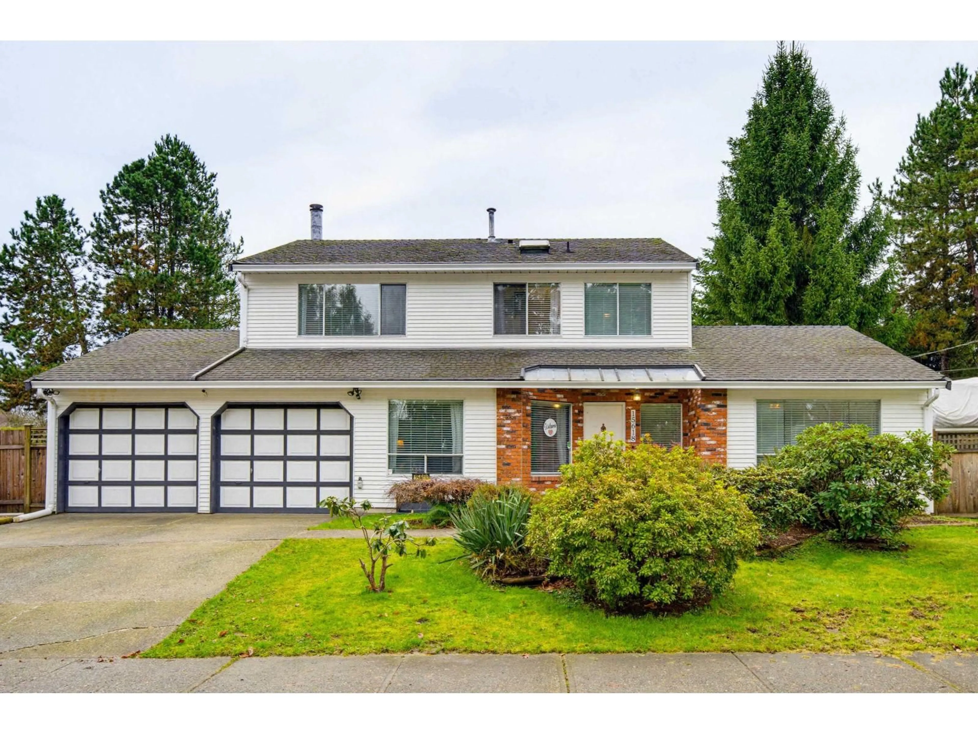 Home with vinyl exterior material, street for 15618 93 AVENUE, Surrey British Columbia V4N3B2