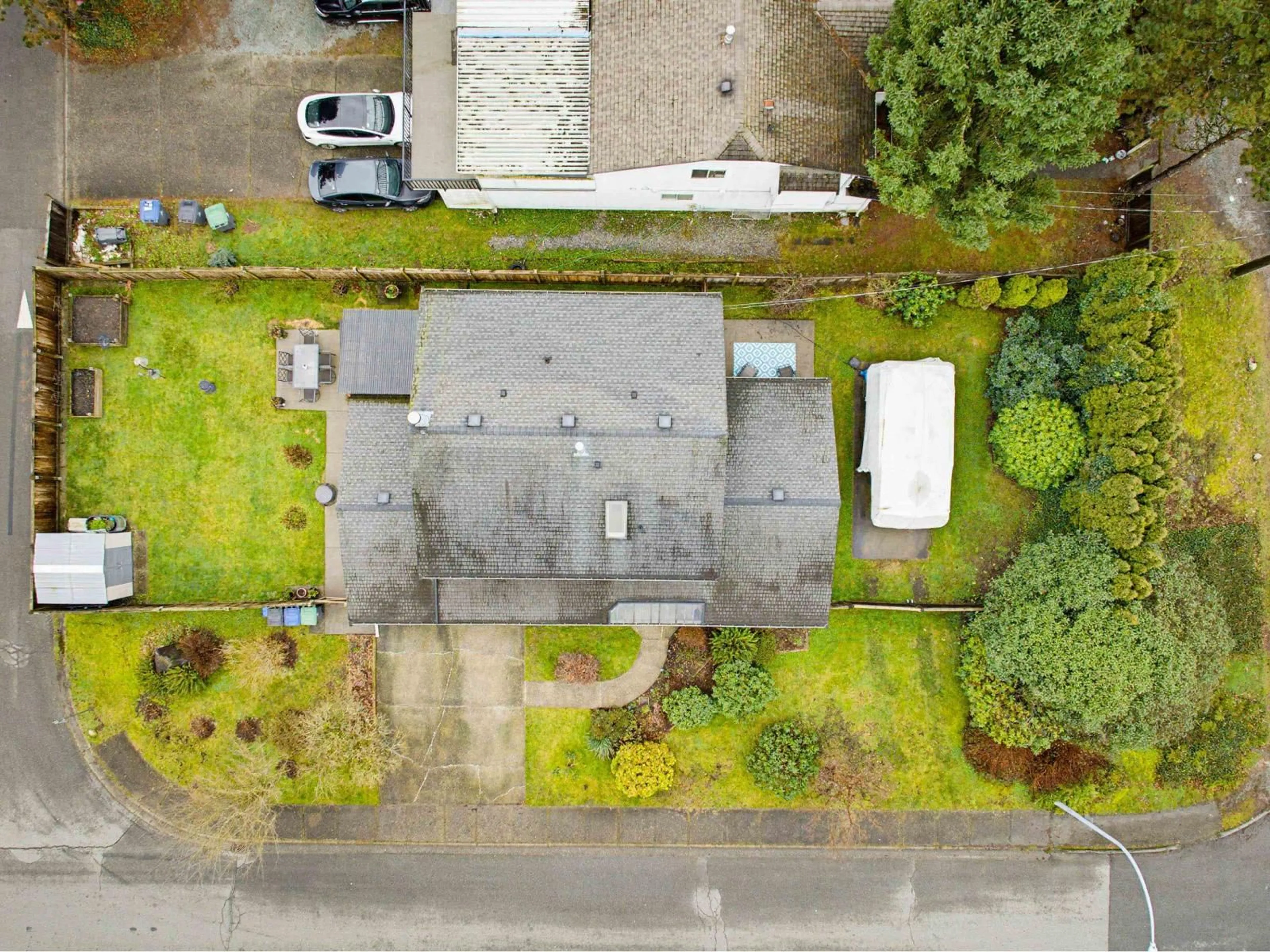A pic from outside/outdoor area/front of a property/back of a property/a pic from drone, street for 15618 93 AVENUE, Surrey British Columbia V4N3B2