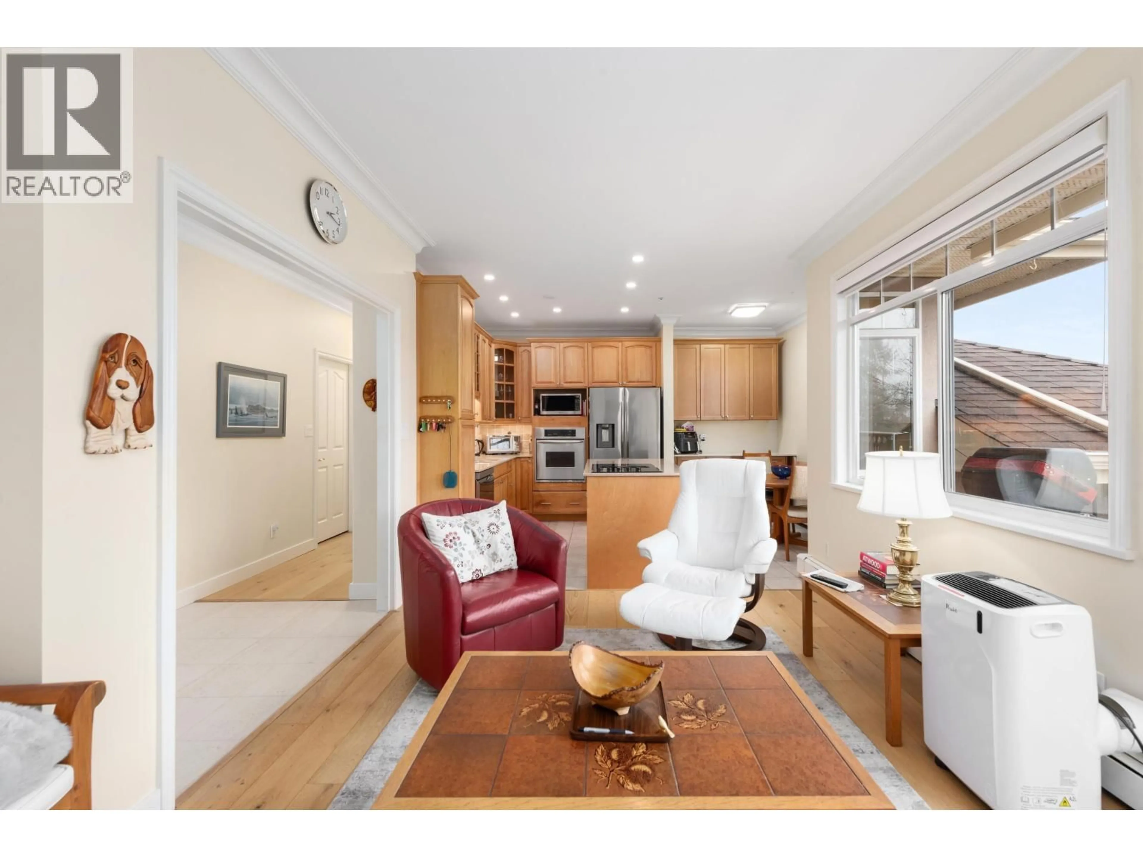 Open concept kitchen, wood/laminate floor for 402 - 1300 HUNTER ROAD, Delta British Columbia V4L1Y8