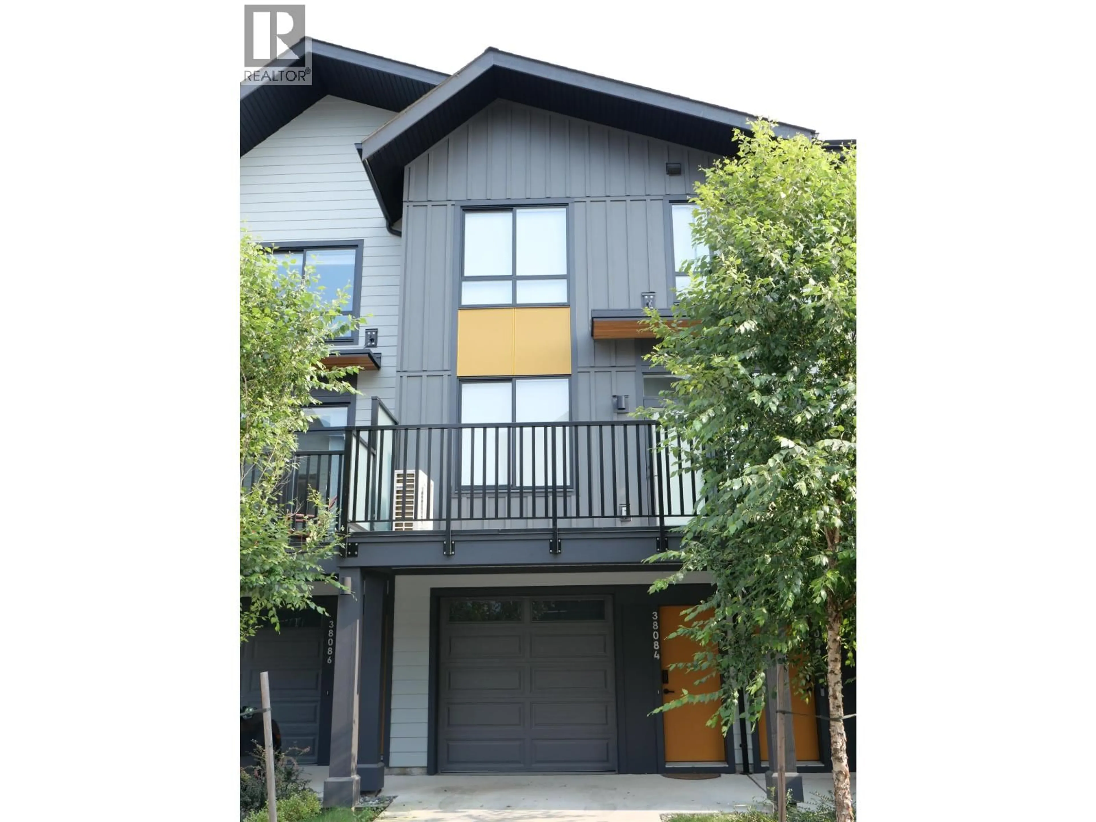 Home with vinyl exterior material, street for 38084 HELM WAY, Squamish British Columbia V8B1E6