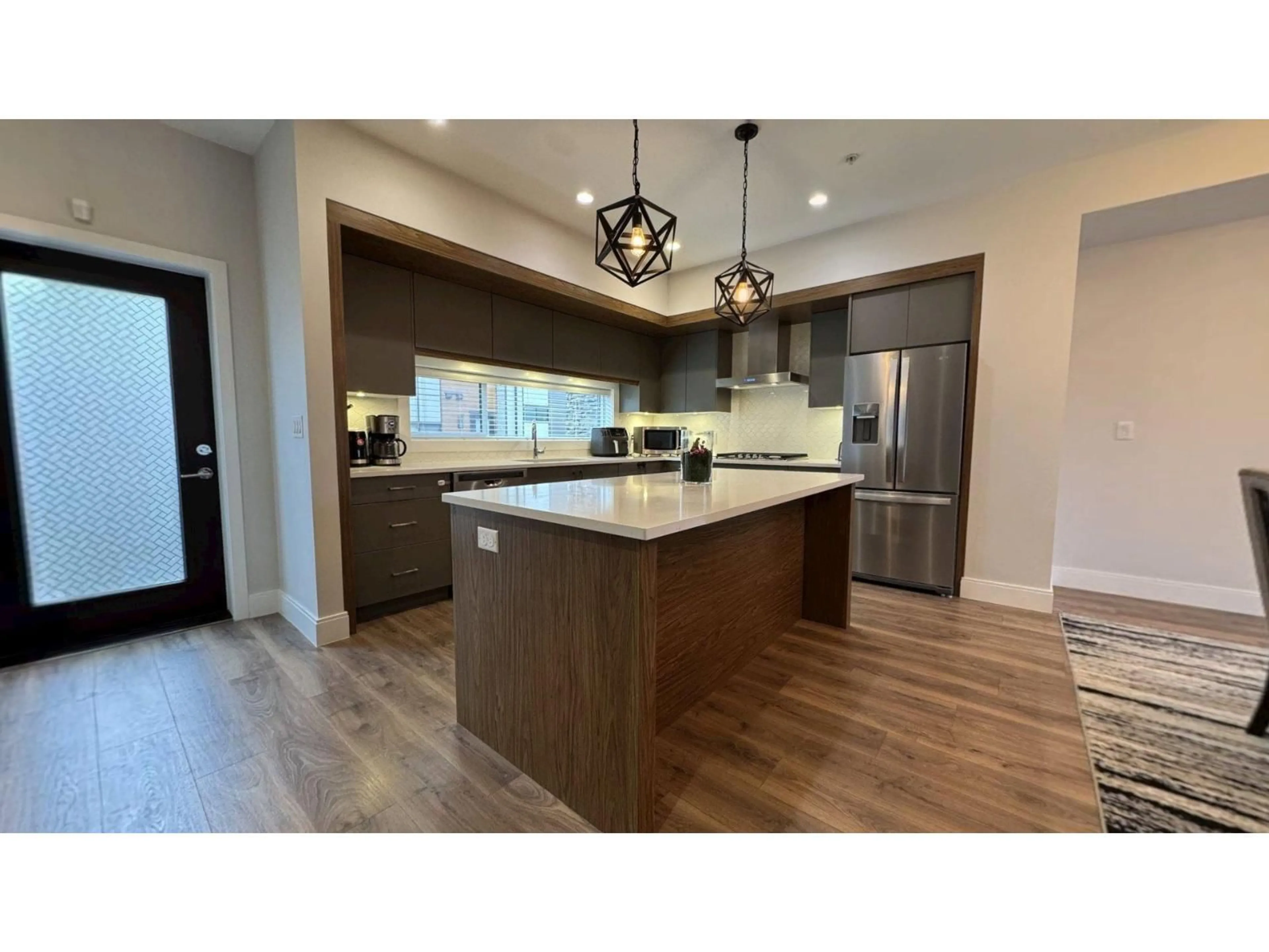 Open concept kitchen, wood/laminate floor for 38 - 33209 CHERRY AVENUE, Mission British Columbia V2V0G8
