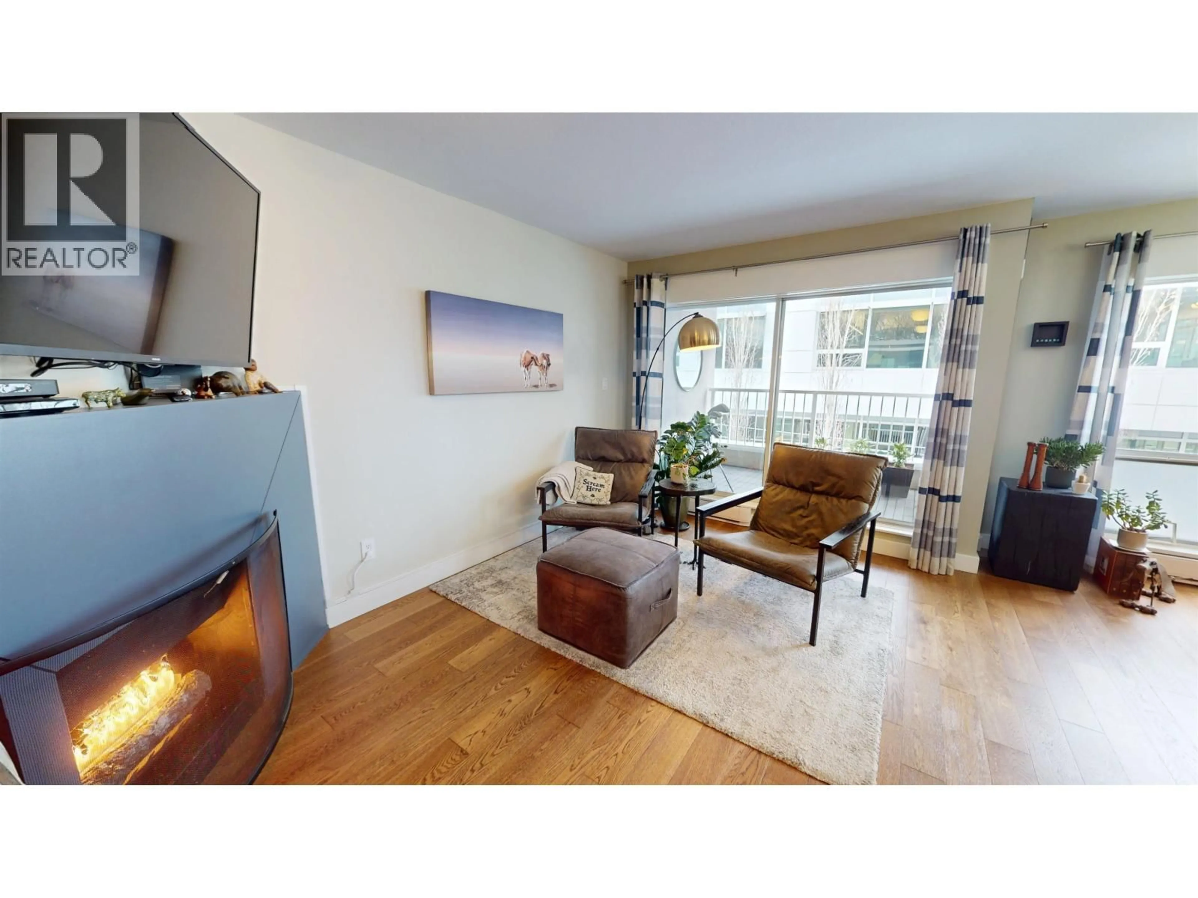Living room with furniture, wood/laminate floor for 403 - 985 10TH AVENUE, Vancouver British Columbia V5Z1L9