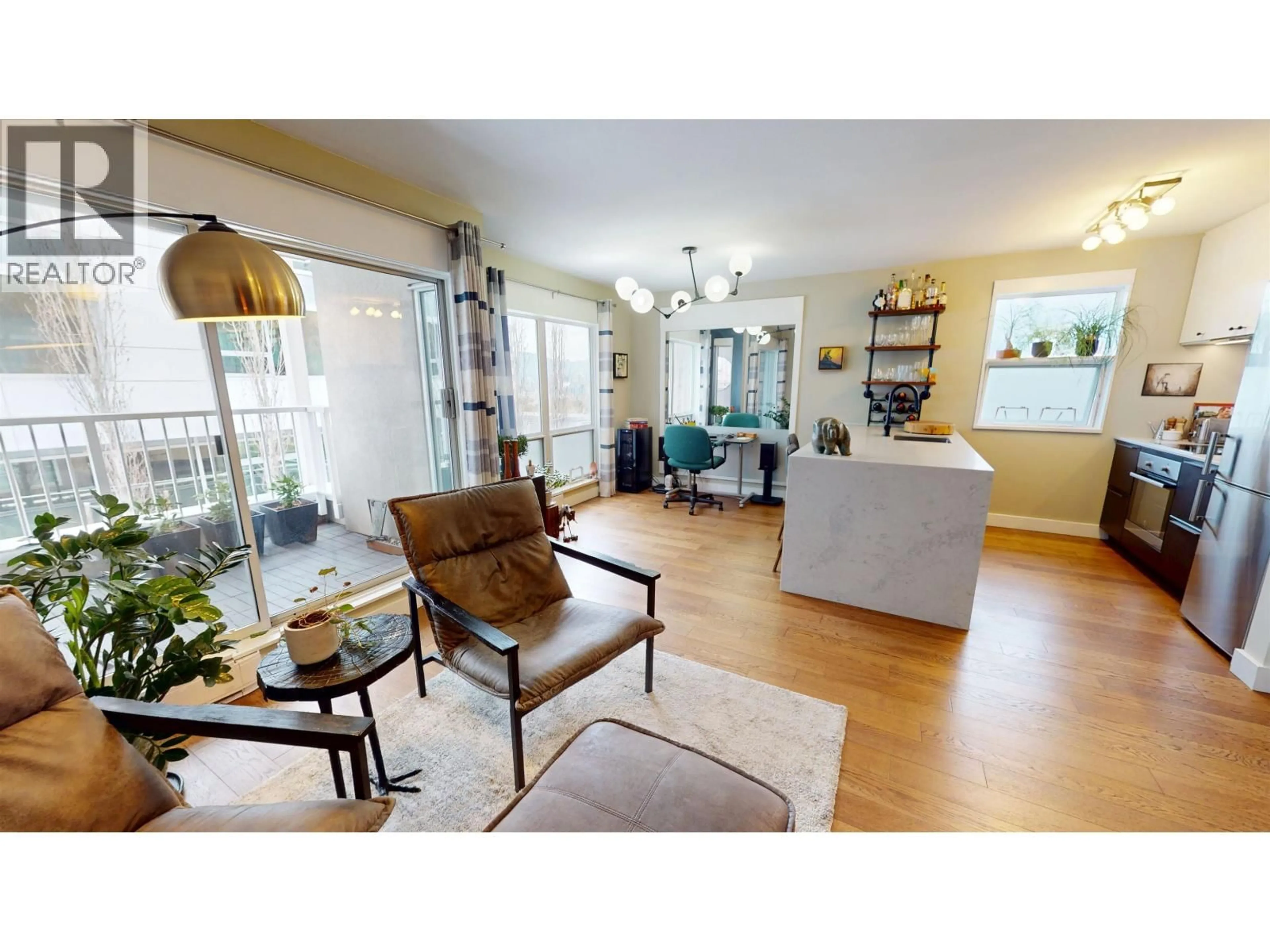 Living room with furniture, wood/laminate floor for 403 - 985 10TH AVENUE, Vancouver British Columbia V5Z1L9