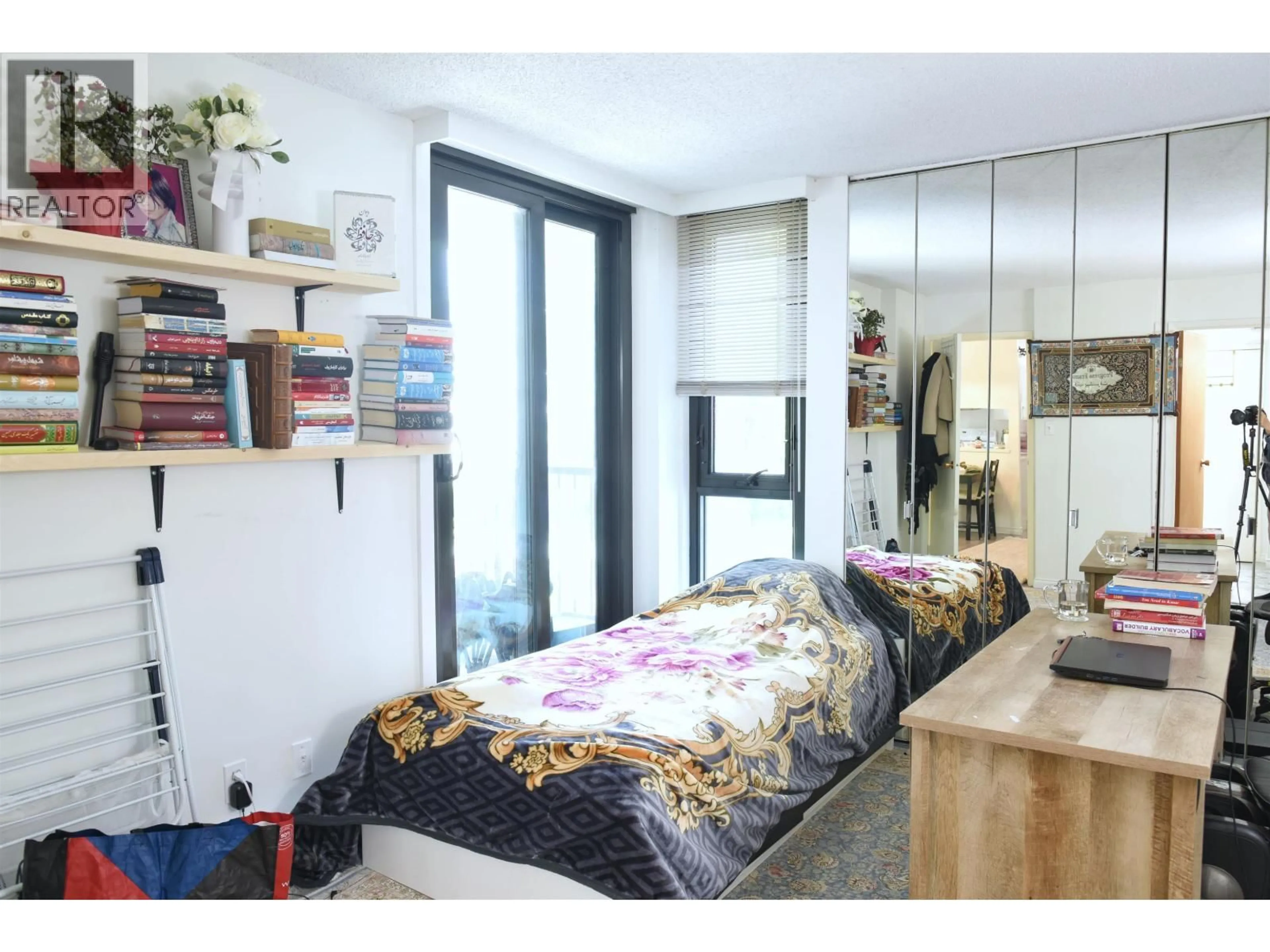 Bedroom with bed, wood/laminate floor for 204 - 6455 WILLINGDON AVENUE, Burnaby British Columbia V5H4E4