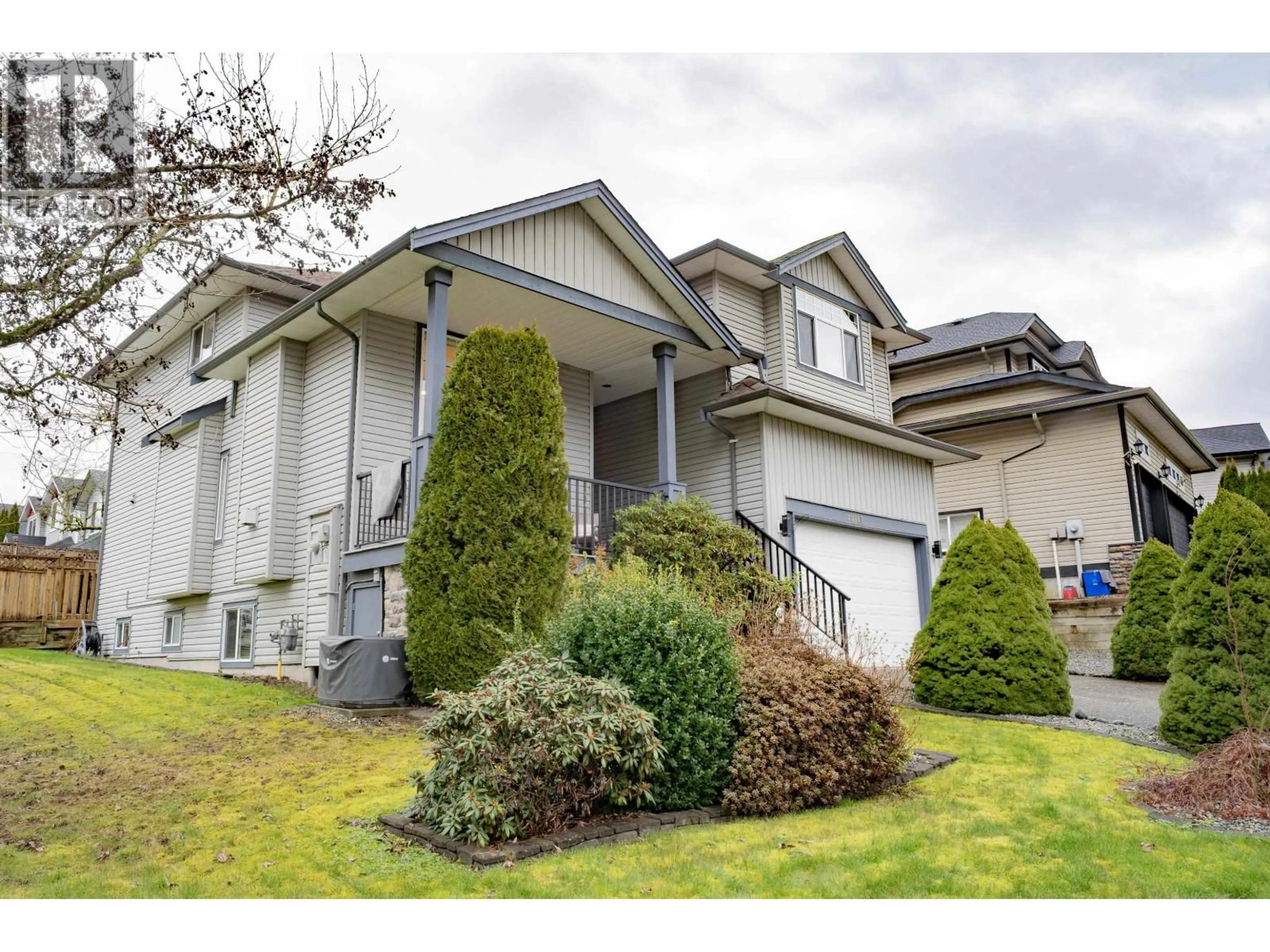 Home with vinyl exterior material, street for 23717 110 AVENUE, Maple Ridge British Columbia V2W1E7