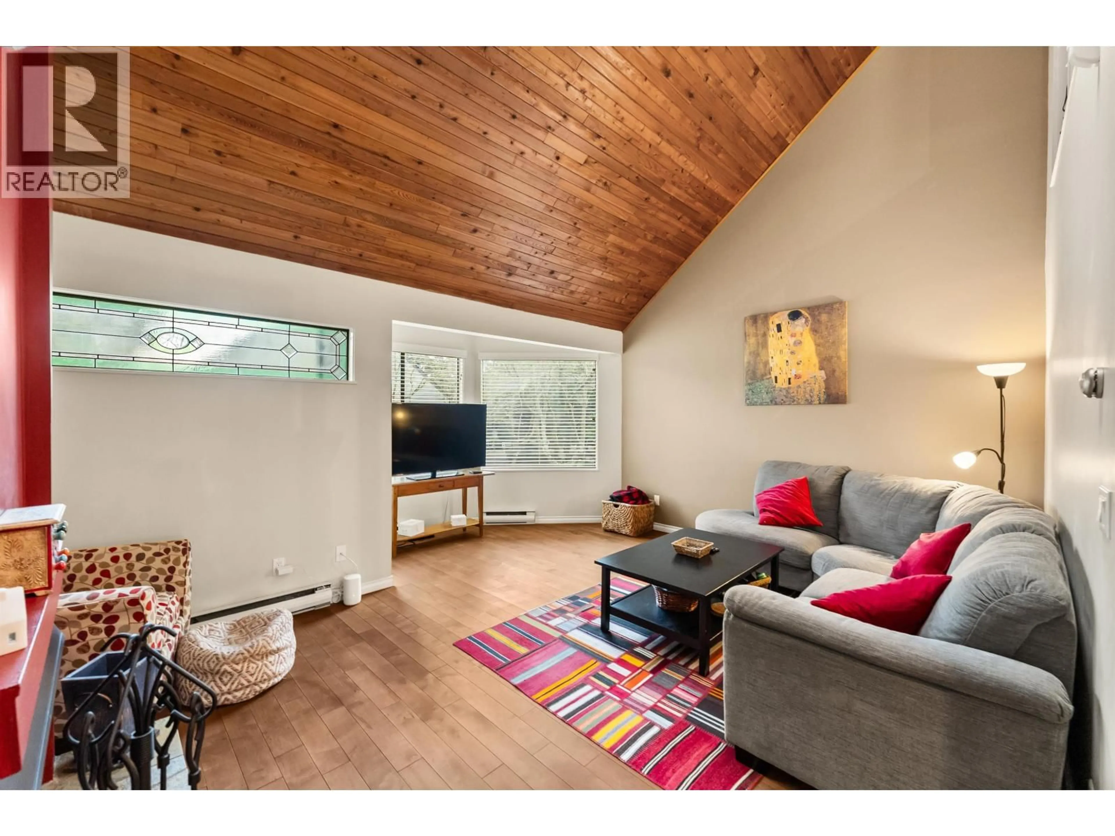 Living room with furniture, wood/laminate floor for 1161 FAIRWAY VIEWS WYND, Delta British Columbia V4L2E2
