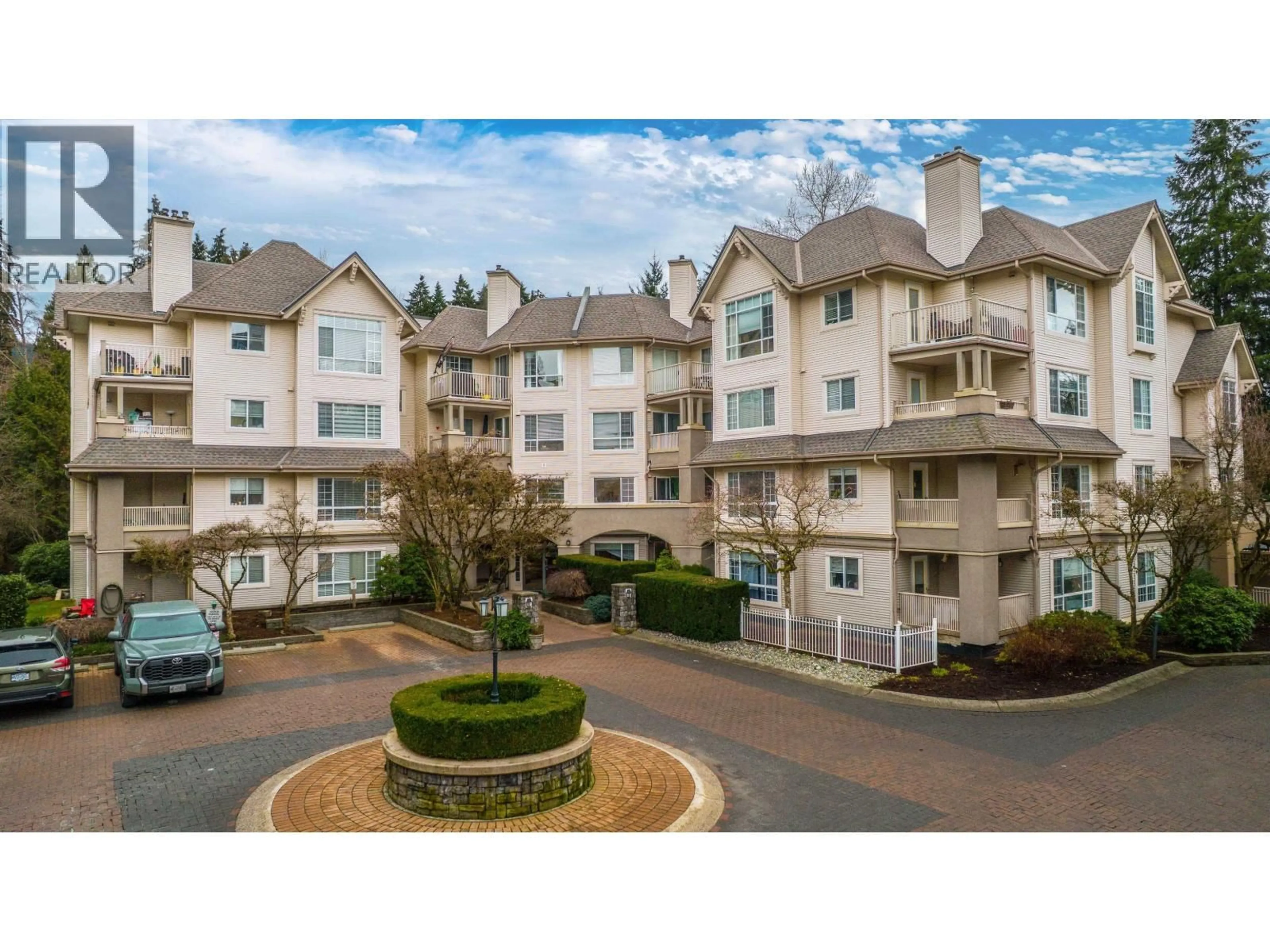 A pic from outside/outdoor area/front of a property/back of a property/a pic from drone, mountain view for 327 - 1252 TOWN CENTRE BOULEVARD, Coquitlam British Columbia V3B7R7