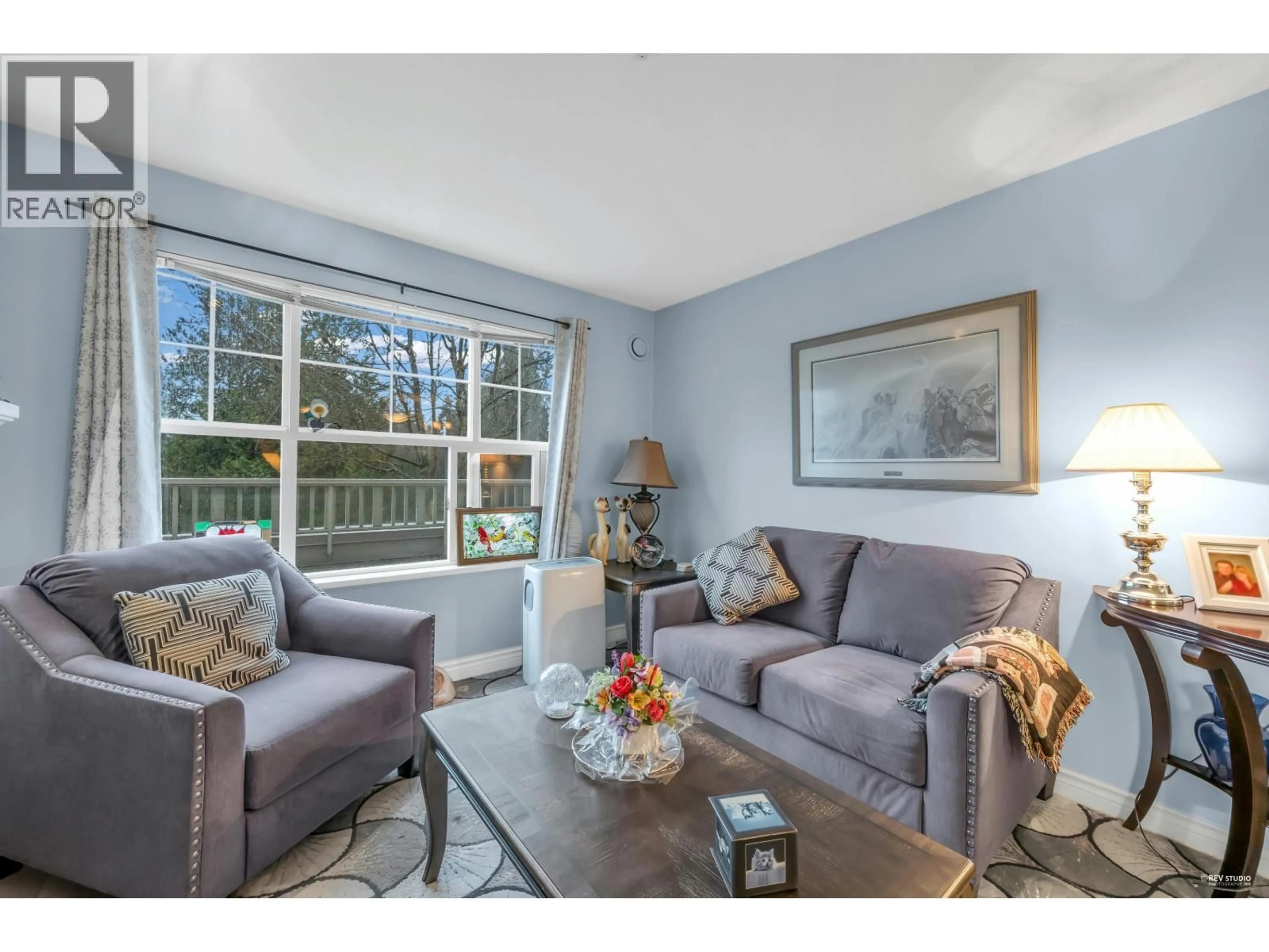 Living room with furniture, unknown for 202 - 960 LYNN VALLEY ROAD, North Vancouver British Columbia V7J3V6