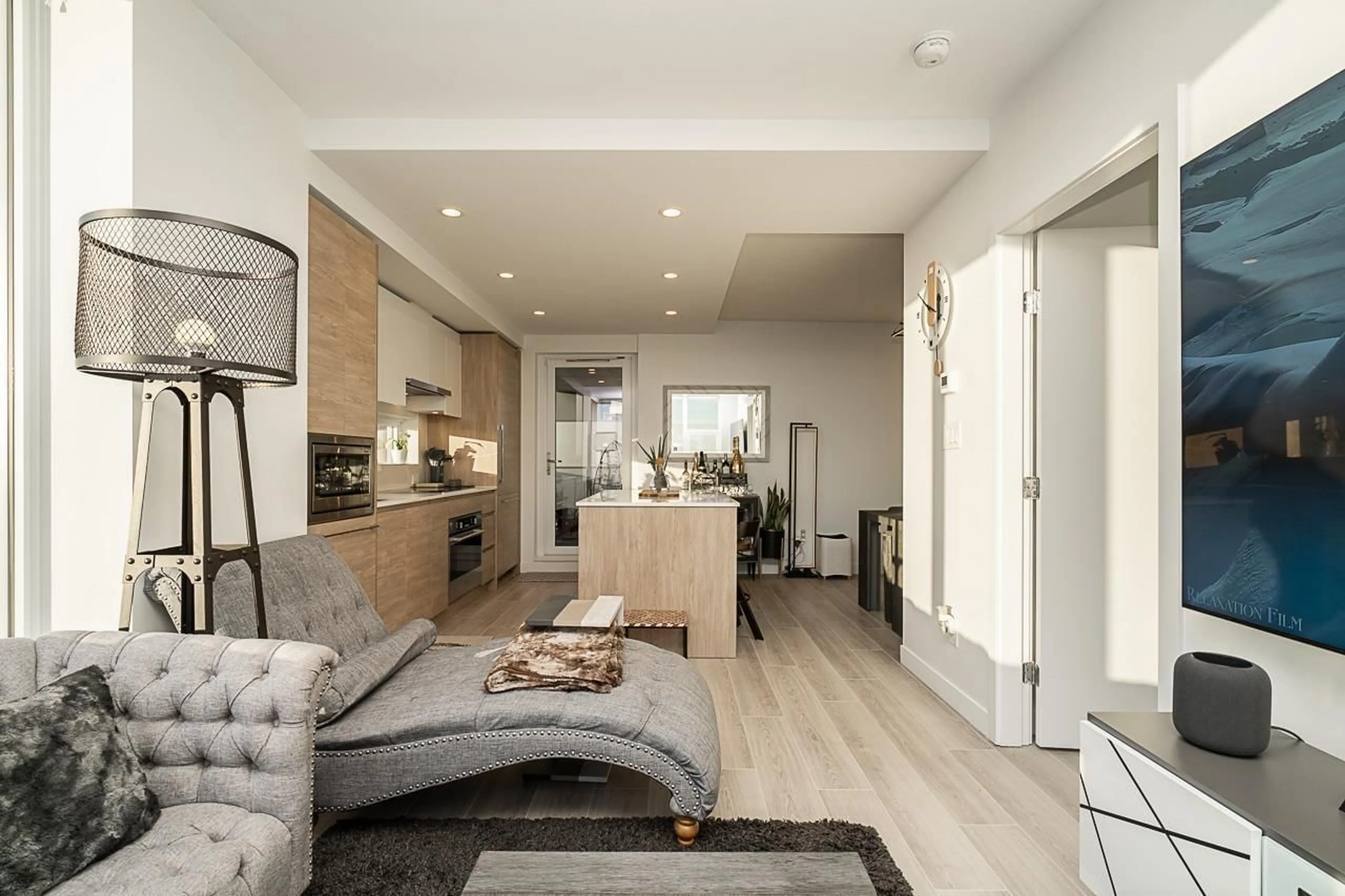 Living room with furniture, wood/laminate floor for 3003 - 13615 FRASER HIGHWAY, Surrey British Columbia V3T0P7