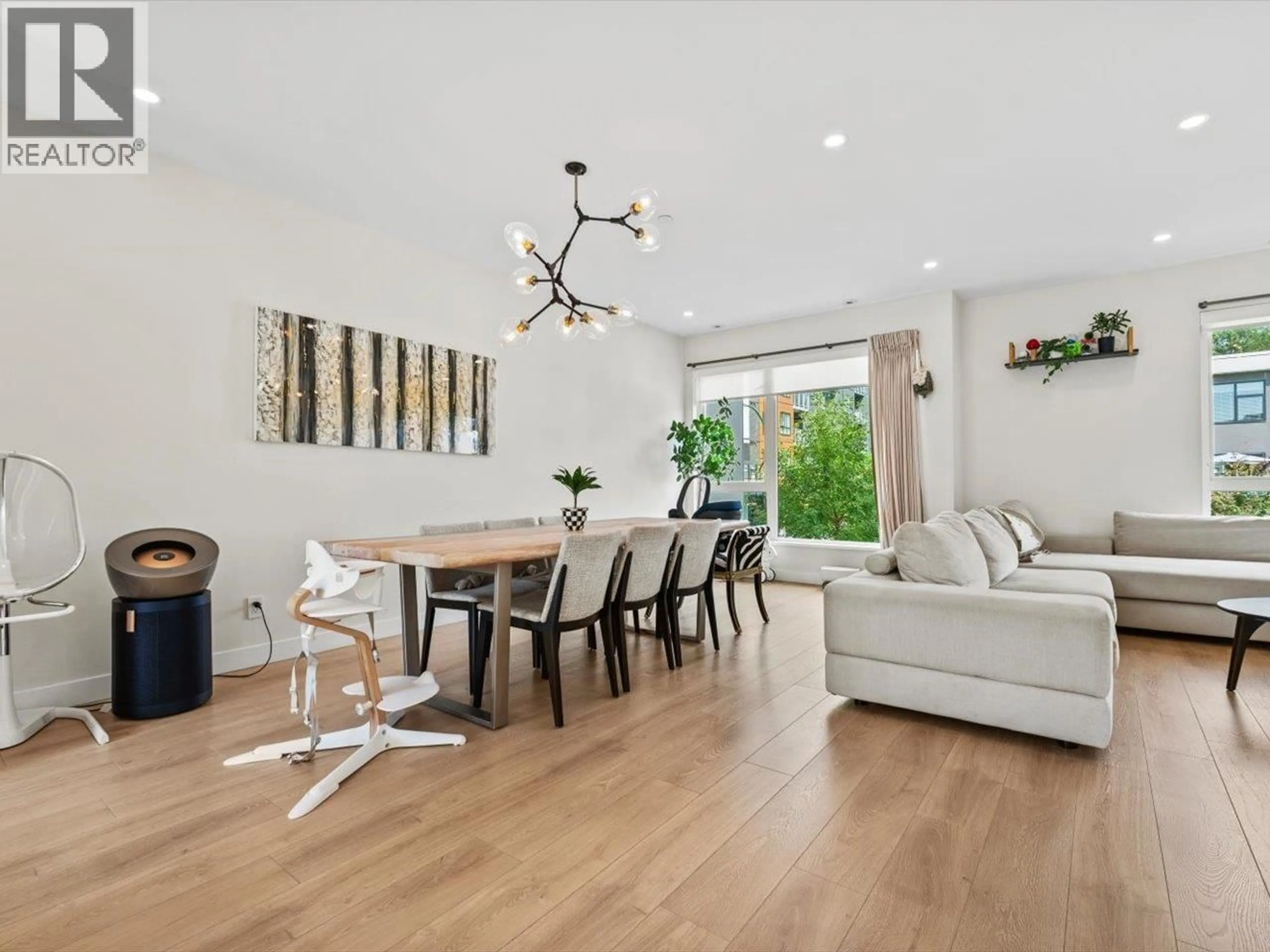 Living room with furniture, wood/laminate floor for 66 - 3597 MALSUM DRIVE, North Vancouver British Columbia V7G0B2