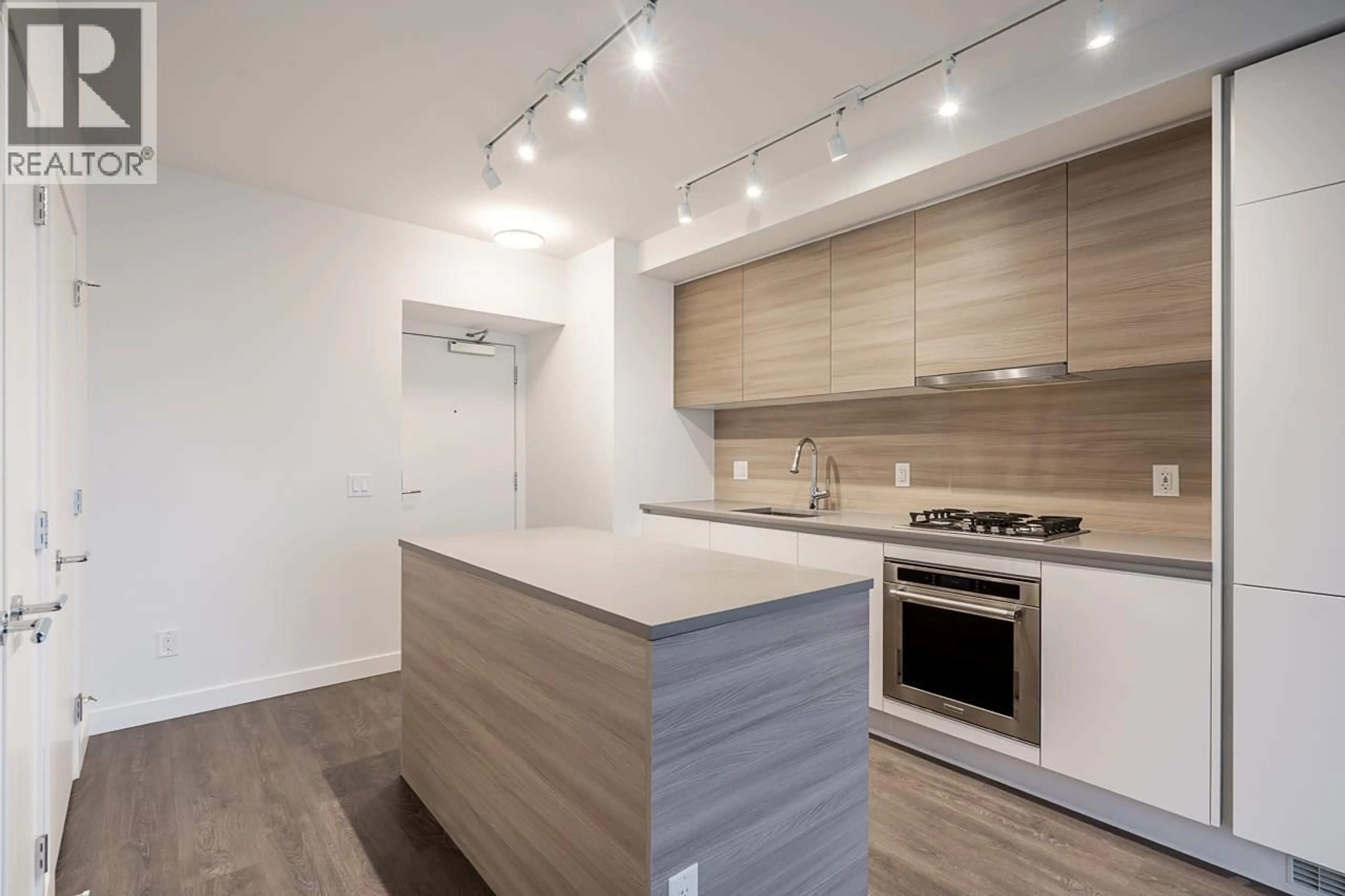 Open concept kitchen, wood/laminate floor for 2006 - 525 FOSTER AVENUE, Coquitlam British Columbia V3J0H6