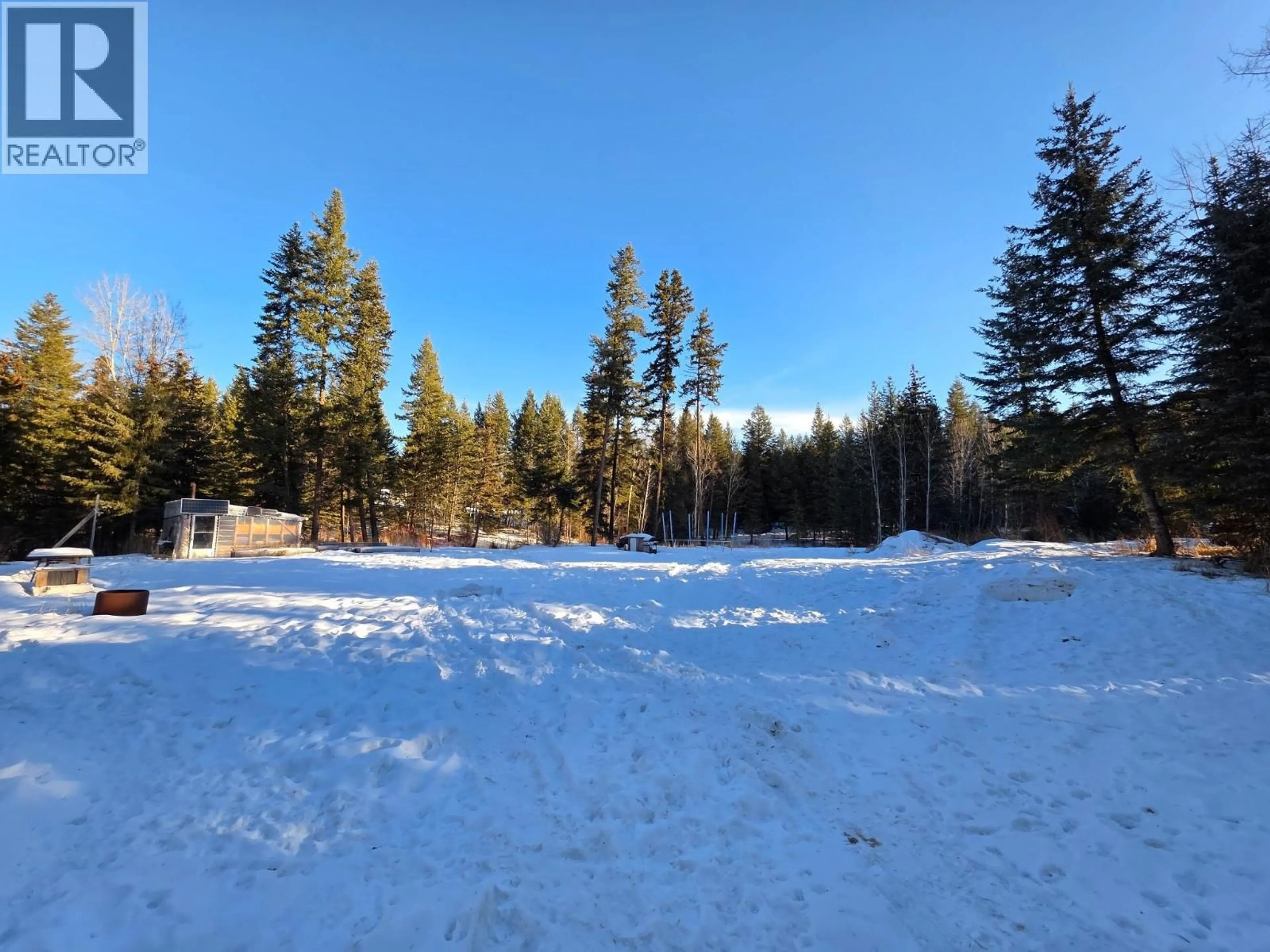 A pic from outside/outdoor area/front of a property/back of a property/a pic from drone, forest/trees view for 542 KEMP ROAD, Williams Lake British Columbia V2G5B4