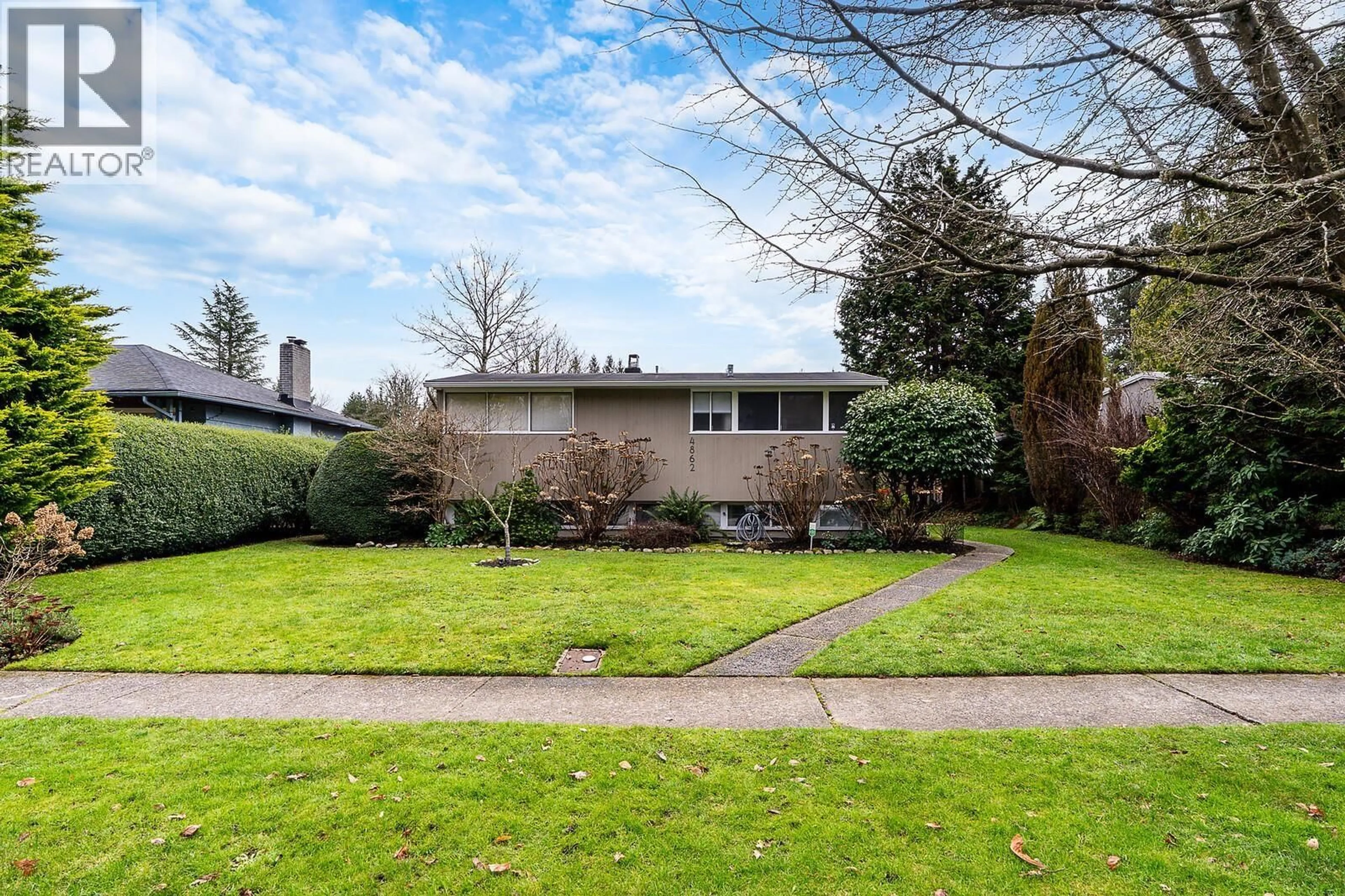 A pic from outside/outdoor area/front of a property/back of a property/a pic from drone, street for 4862 QUEENSLAND ROAD, Vancouver British Columbia V6T1G2
