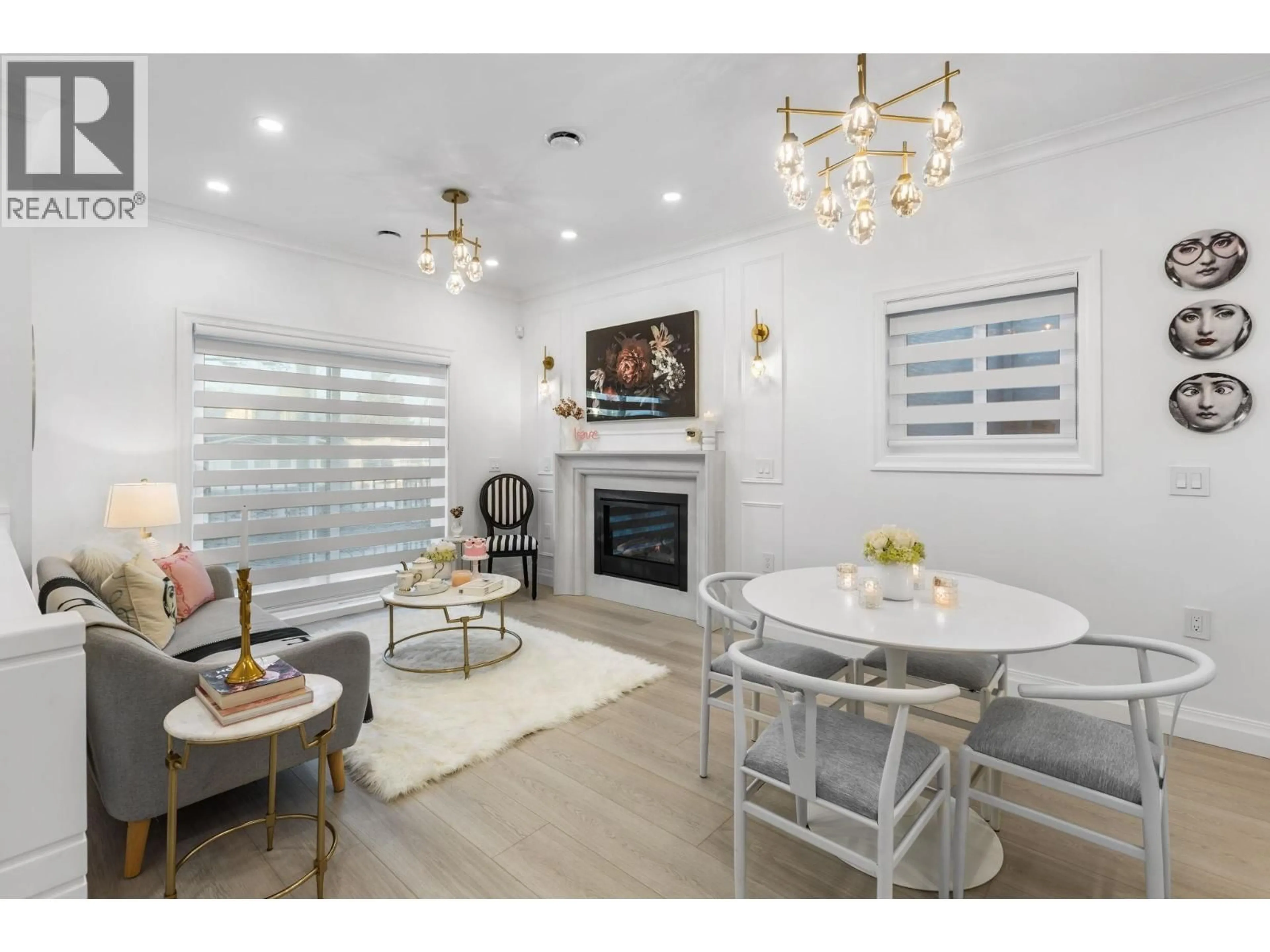 Living room with furniture, wood/laminate floor for 5136 DOMINION STREET, Burnaby British Columbia V5G1C9