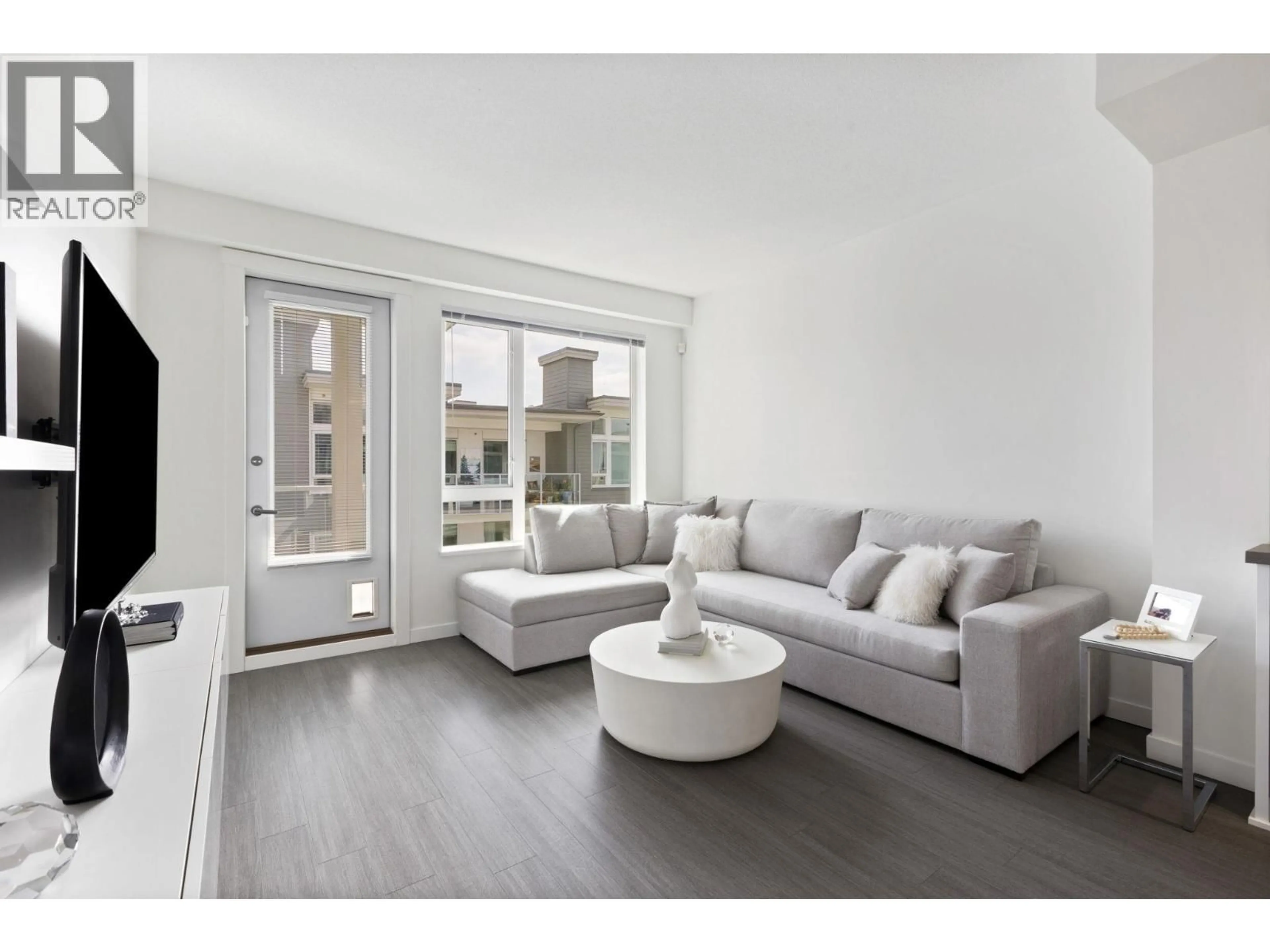 Living room with furniture, unknown for 501 - 277 1ST STREET, North Vancouver British Columbia V7M0E8