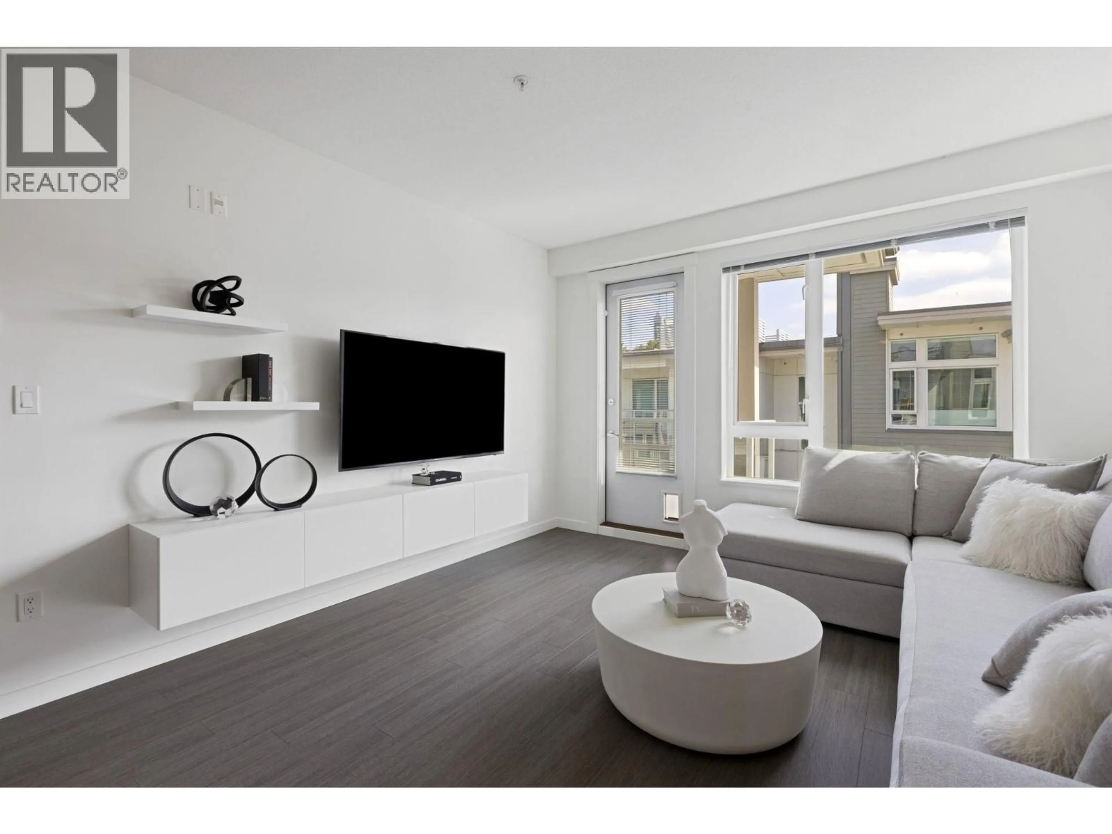 Living room with furniture, unknown for 501 - 277 1ST STREET, North Vancouver British Columbia V7M0E8