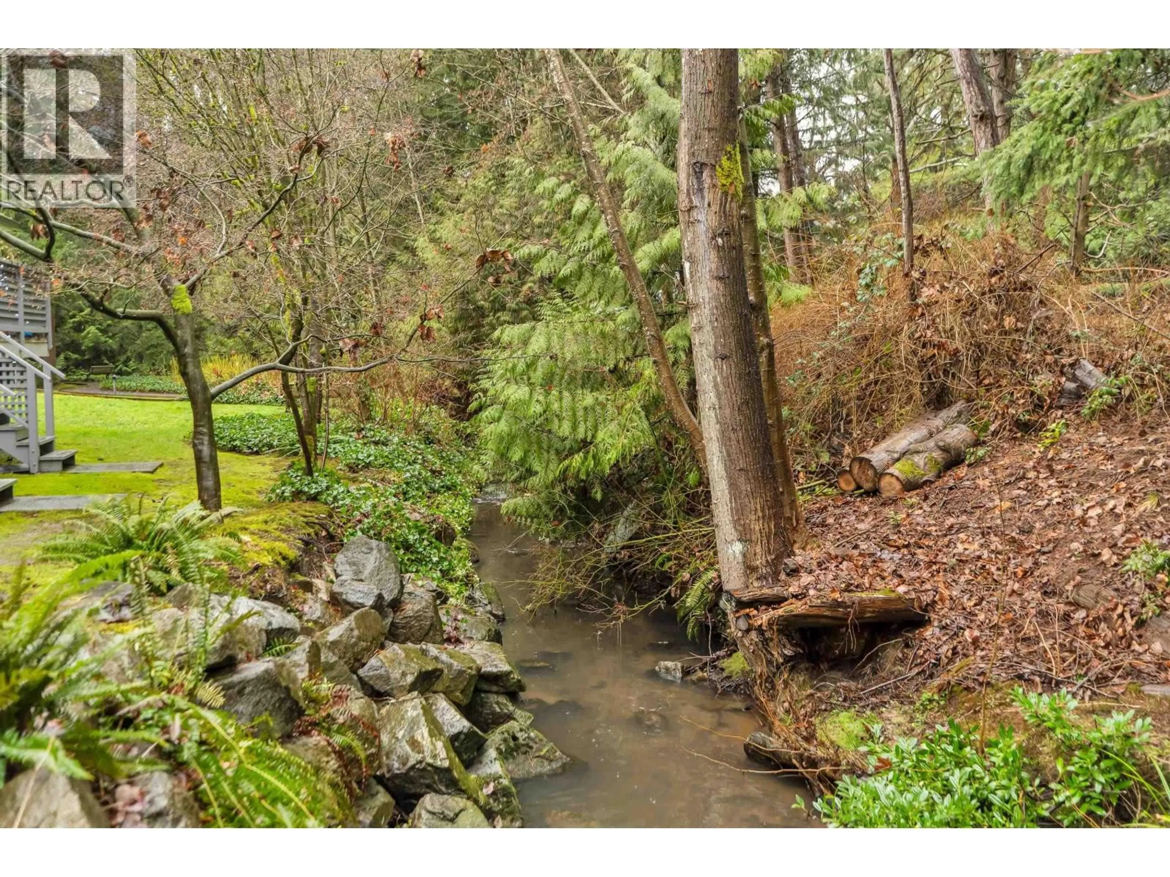 A pic from outside/outdoor area/front of a property/back of a property/a pic from drone, forest/trees view for 12 - 3634 GARIBALDI DRIVE, North Vancouver British Columbia V7H2X5