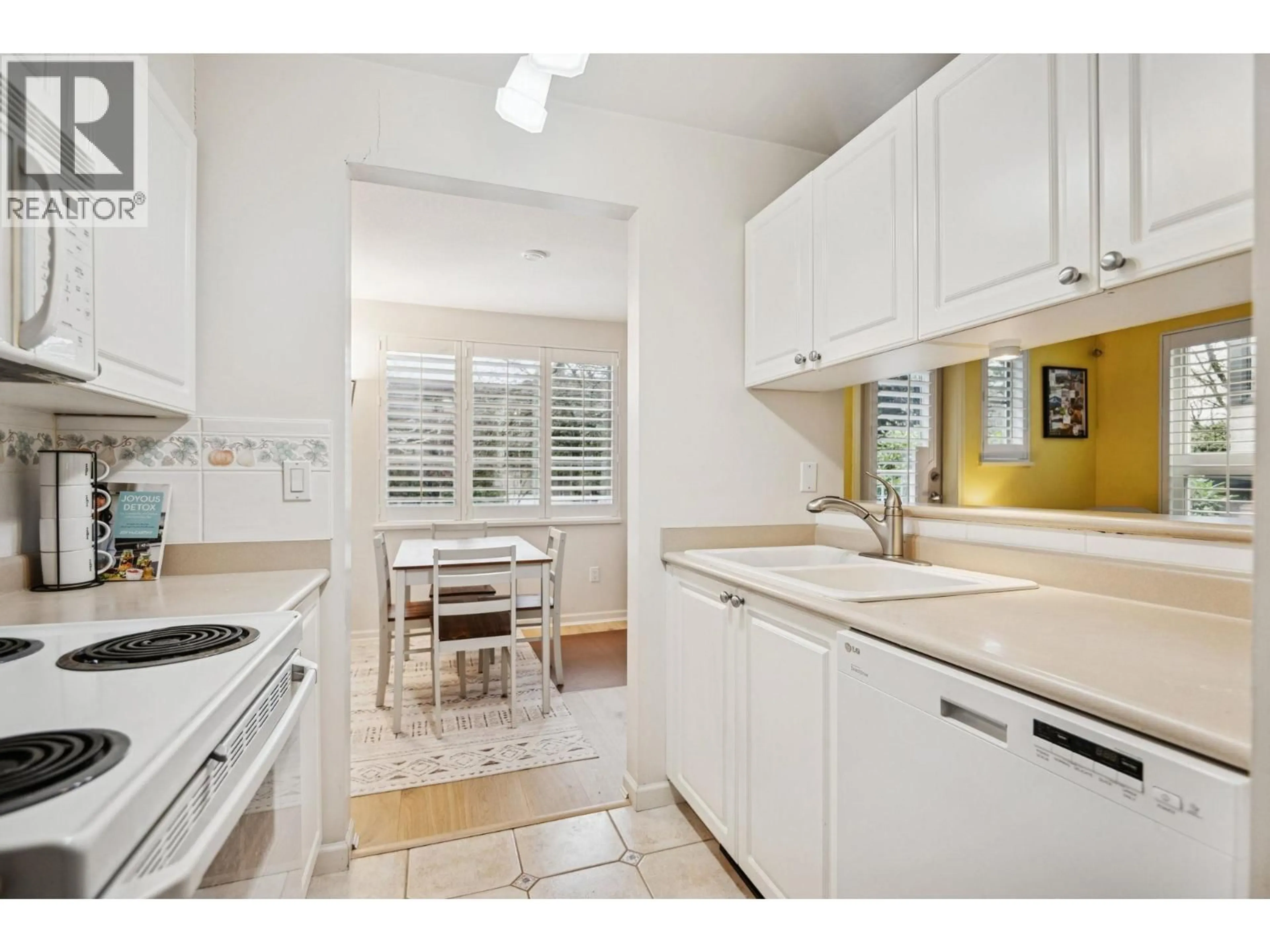 Standard kitchen, ceramic/tile floor for 206 - 2490 2ND AVENUE, Vancouver British Columbia V6K1J6