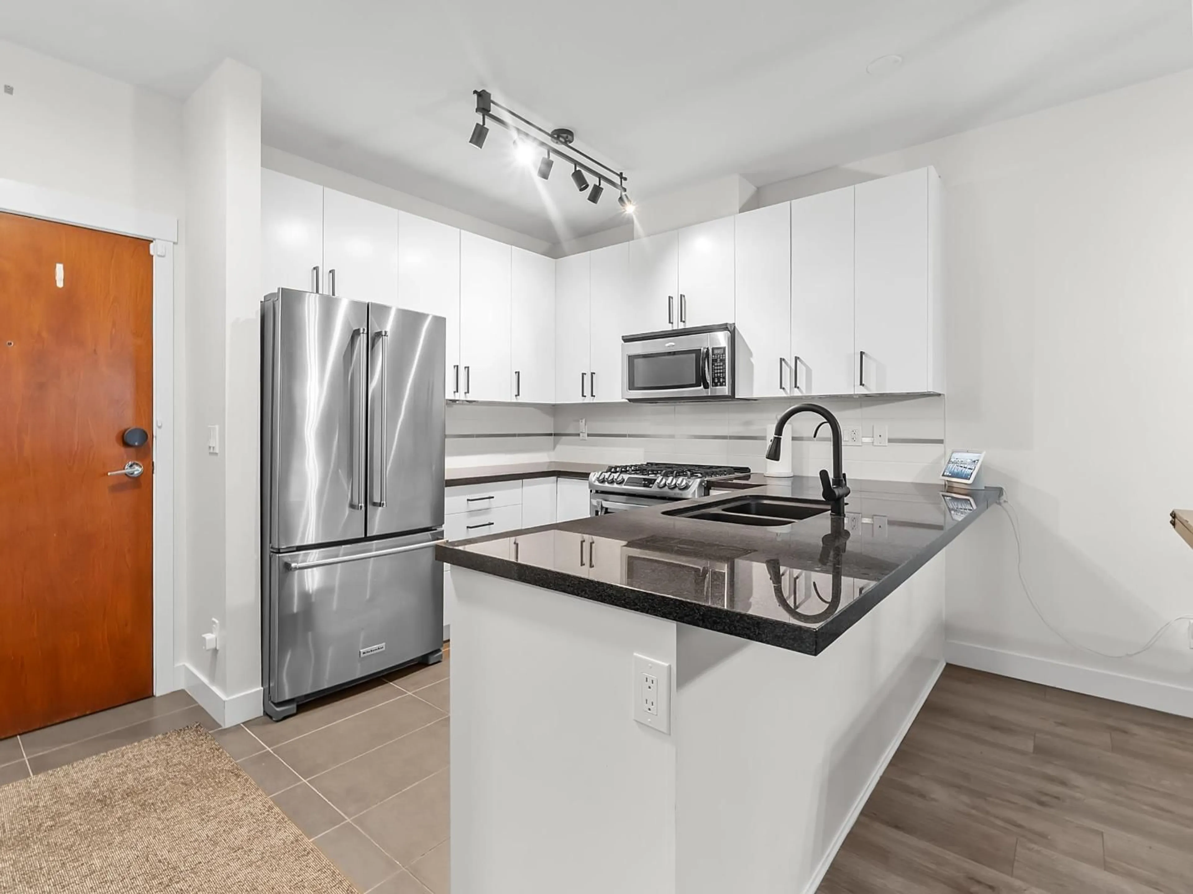 Open concept kitchen, unknown for 108 - 15918 26 AVENUE, Surrey British Columbia V3Z5K3
