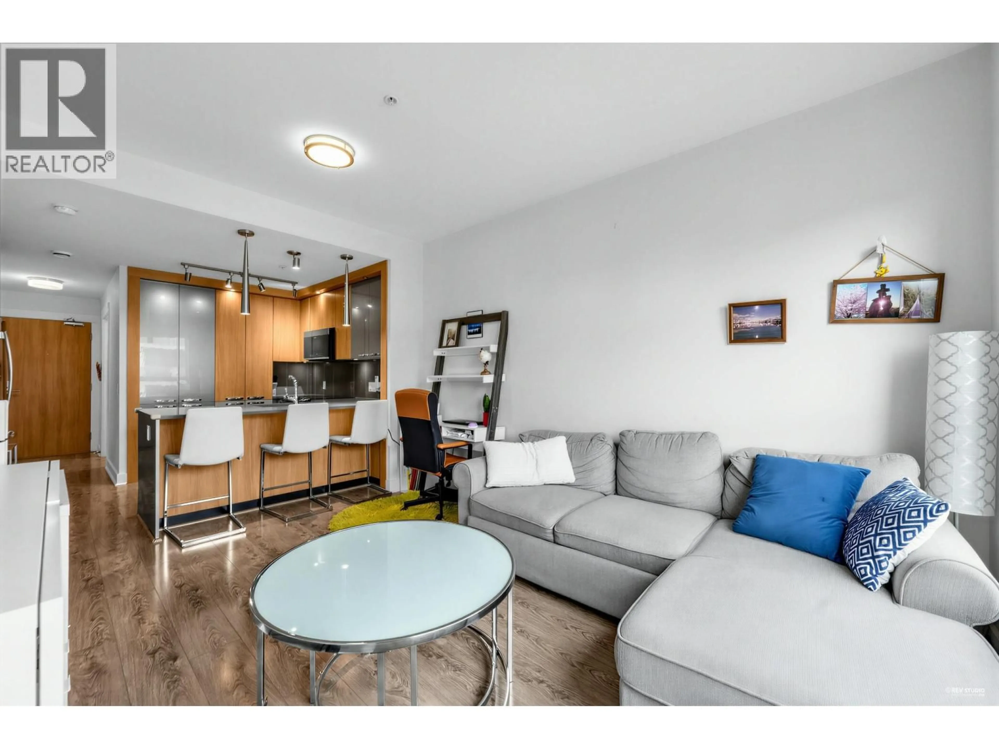 Living room with furniture, wood/laminate floor for 307 - 733 14 STREET, North Vancouver British Columbia V7M0C6