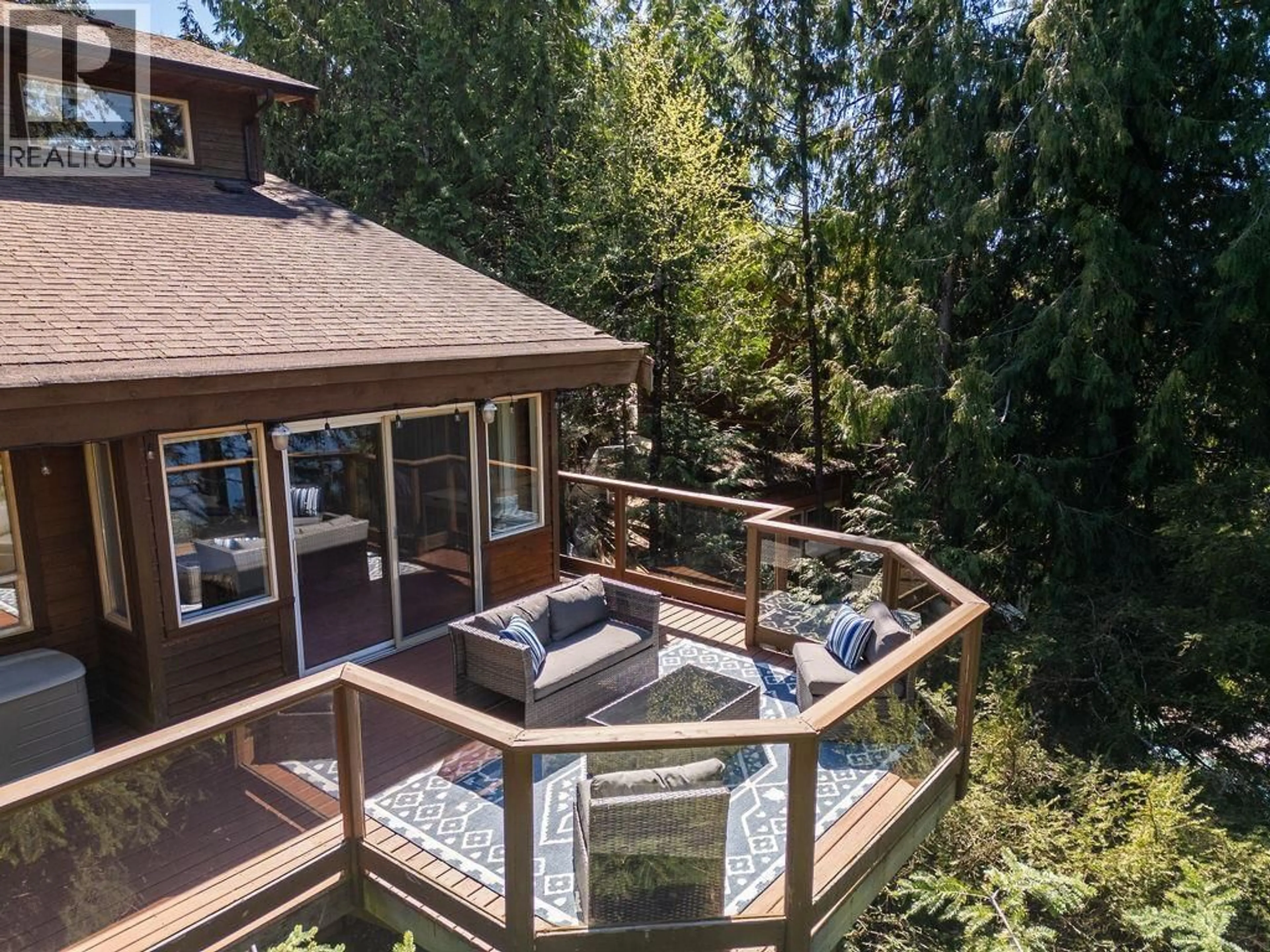 A pic from outside/outdoor area/front of a property/back of a property/a pic from drone, water/lake/river/ocean view for 5864 SKOOKUMCHUK ROAD, Sechelt British Columbia V0N3A4