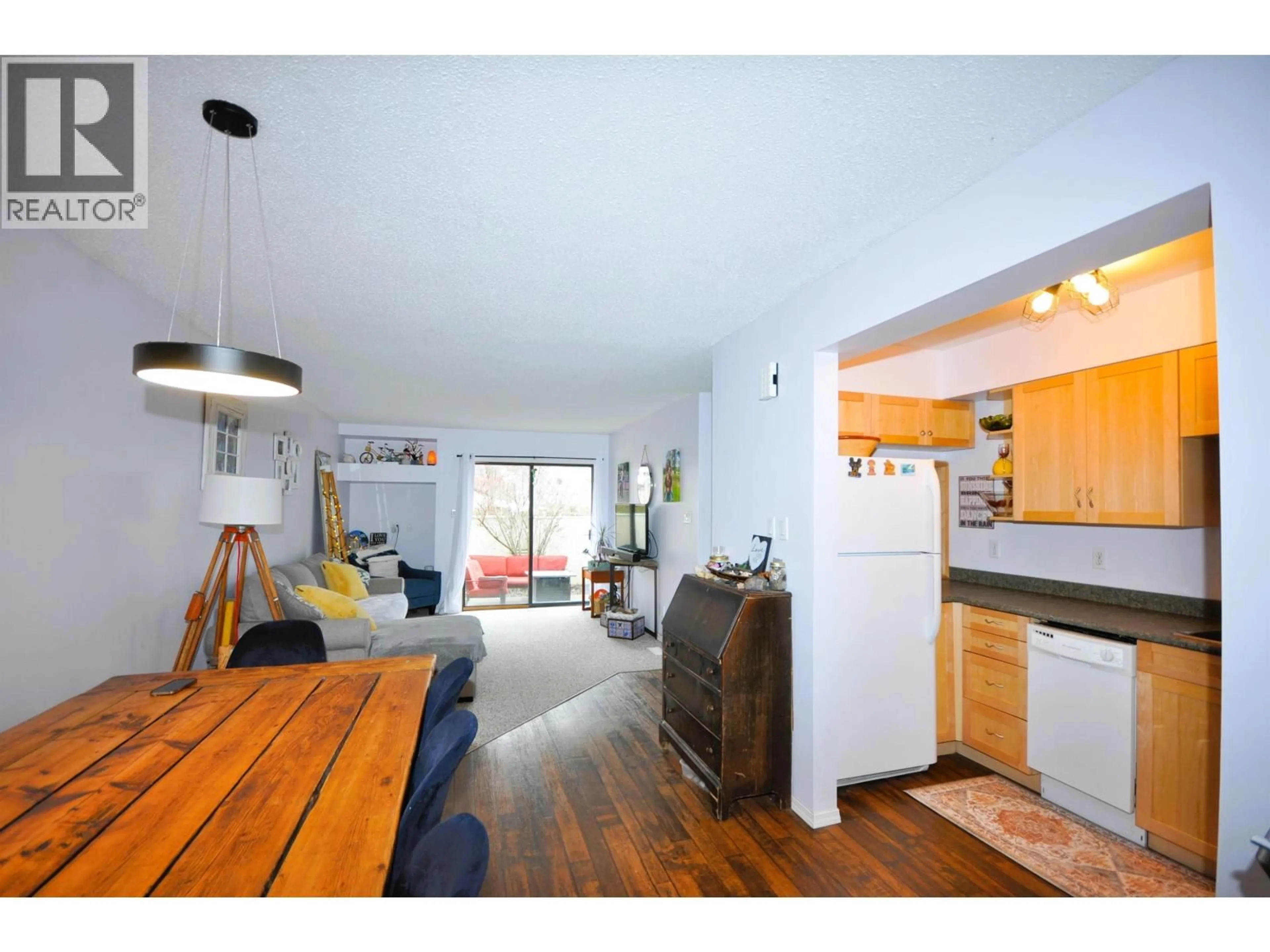 Open concept kitchen, wood/laminate floor for 44 - 800 2ND AVENUE, Williams Lake British Columbia V2G4C4